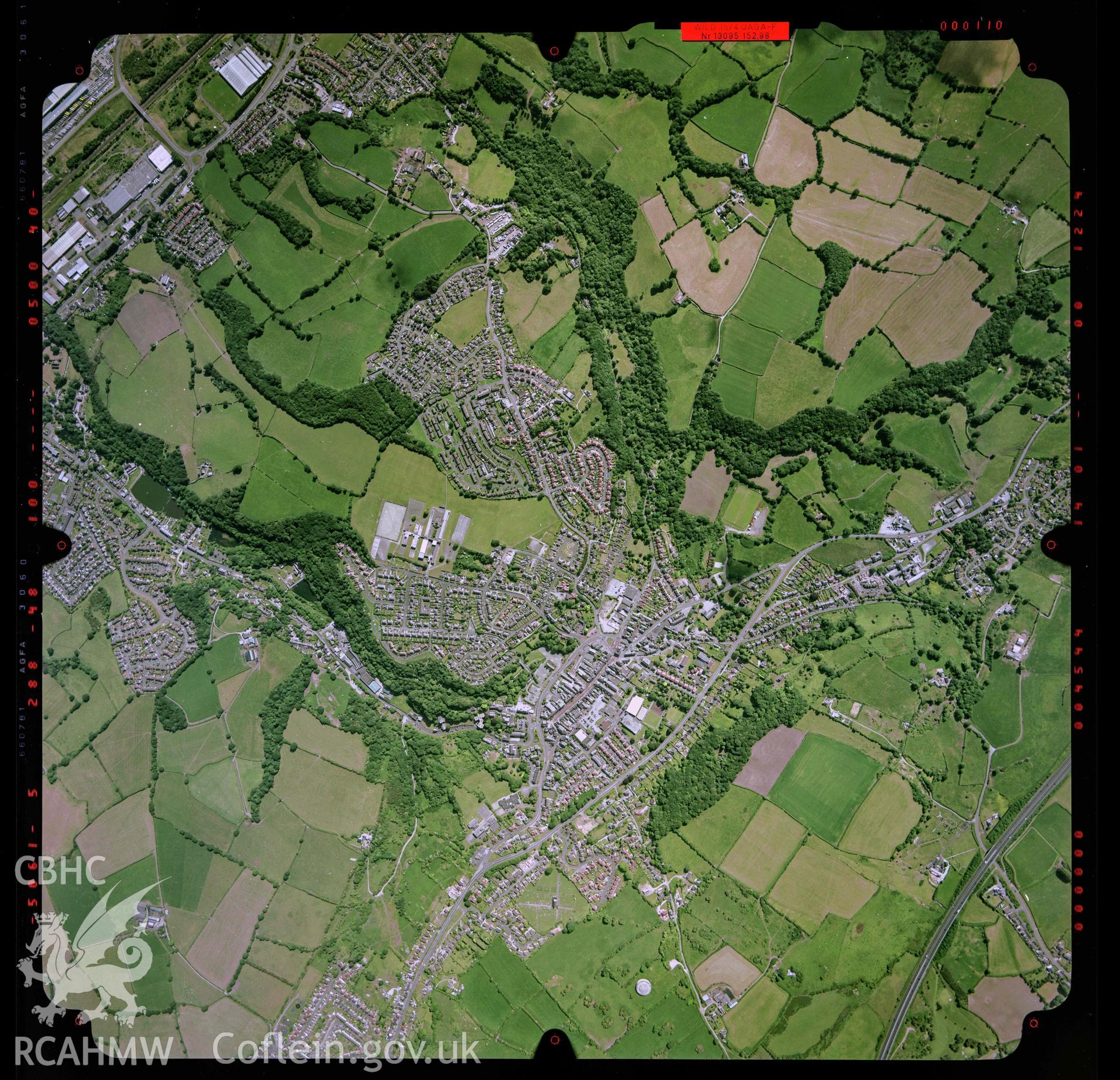 Digitized copy of an aerial photograph showing an area near Holywell, taken by Ordnance Survey, 2004. [Flight: 04-557 Fr 110].