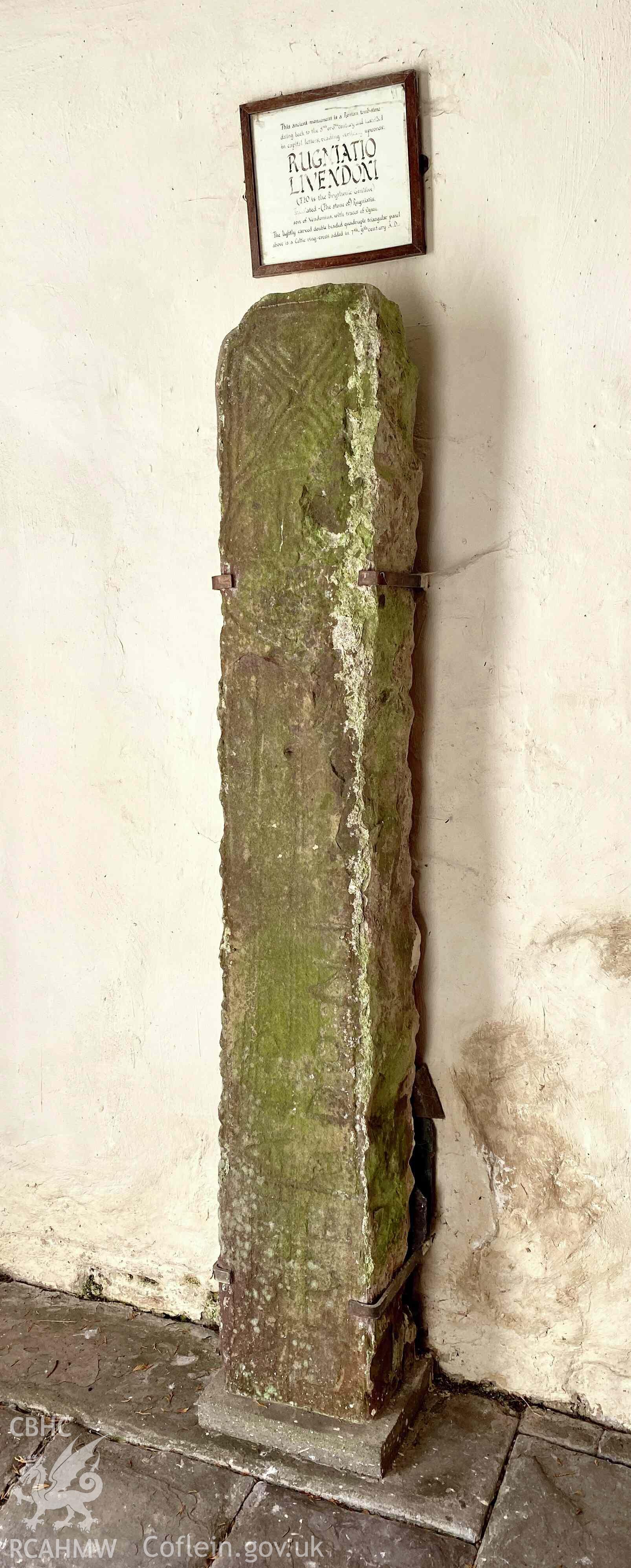 Colour digital photograph showing the Early Christian inscribed stone in Defynnog church, taken in October 2022 by Alan Hughes.