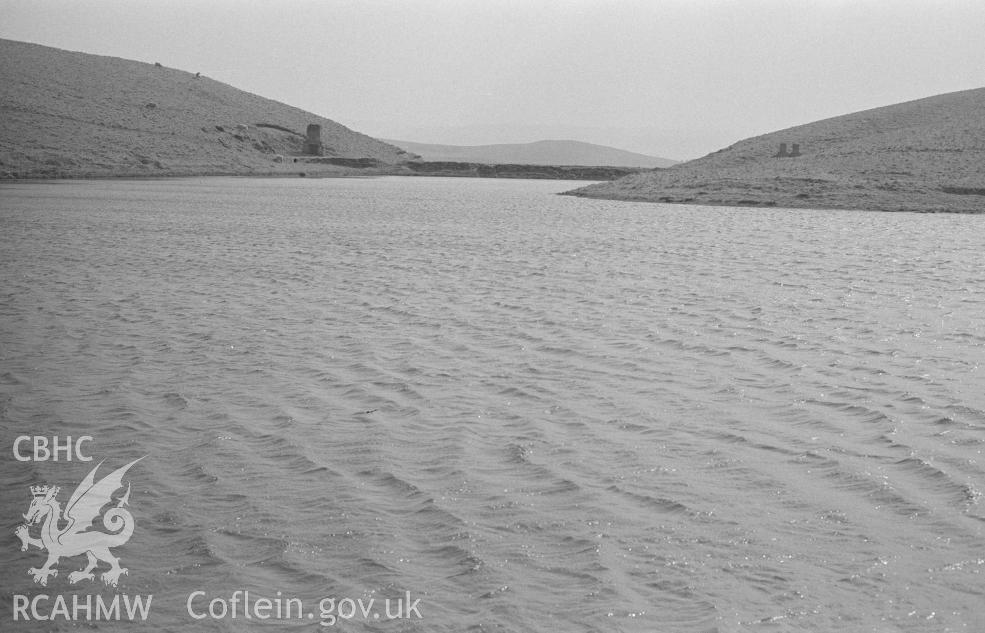 Digital copy of a black and white negative showing the reservoir of Glog-Fawr leadmine. Photographed by Arthur Chater on 14 April 1968. Looking south from Grid Reference SN 749 709.