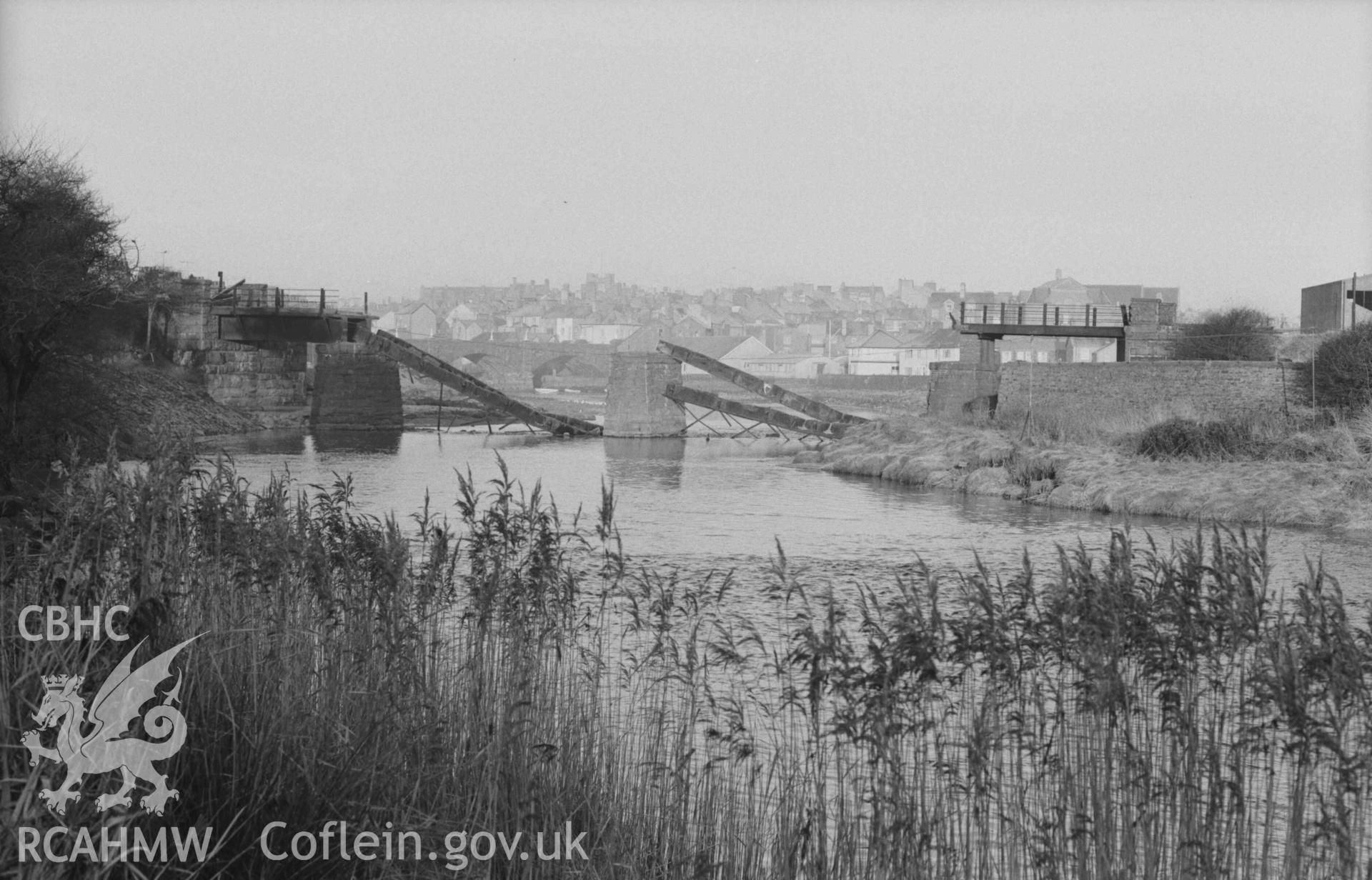 Digital copy of a black and white negative showing railway bridge over the Rheidol, from Dyffryn Rheidol. Photographed by Arthur Chater on 27 December 1968. Looking north west from Grid Reference SN 5859 8103.