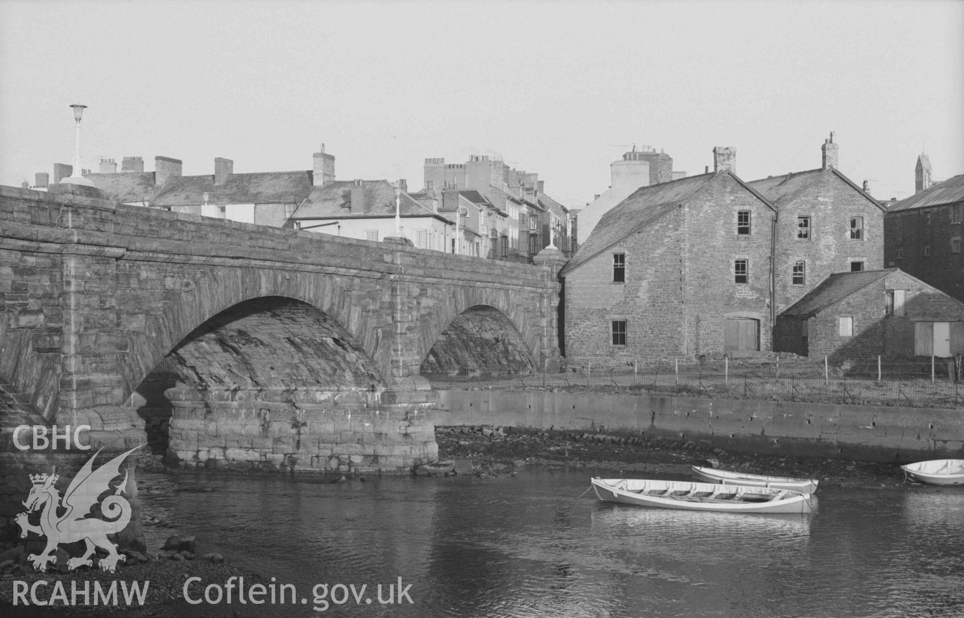 Digital copy of a black and white negative showing Trefechan Bridge from Glanyrafon Terrace. Photographed by Arthur Chater on 27 December 1968. Looking north north west from Grid Reference SN 5831 8127.