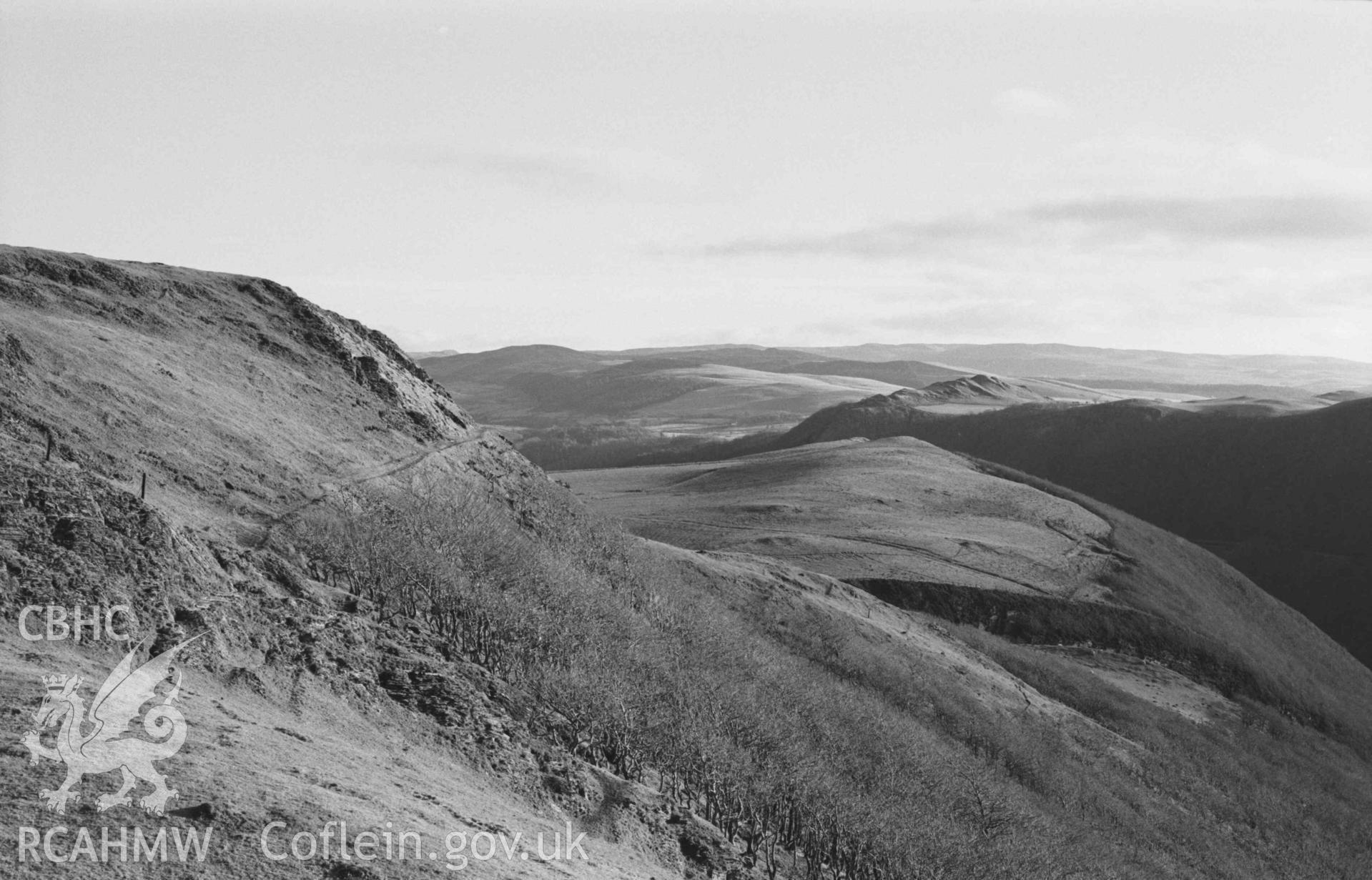 Digital copy of a black and white negative showing Castell Bwa Drain (panorama, photo 3 of 3). Photographed by Arthur Chater on 5 January 1969. Looking east from Grid Reference SN 712 795.