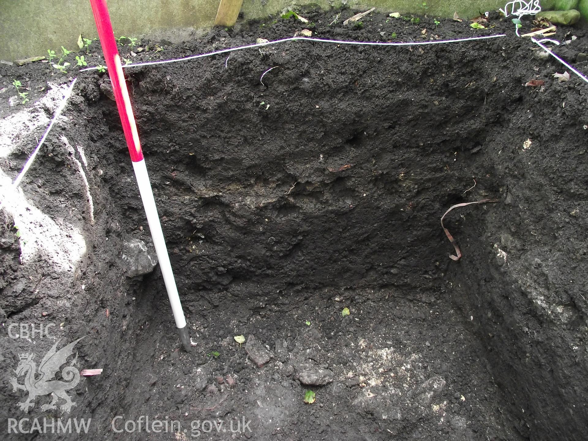 Digital photograph showing excavated area at 1A White Hart Lane and 30 High Street (Bank House), Caerleon. Produced by M. Lewis, National Roman Legion Museum. August 2012.