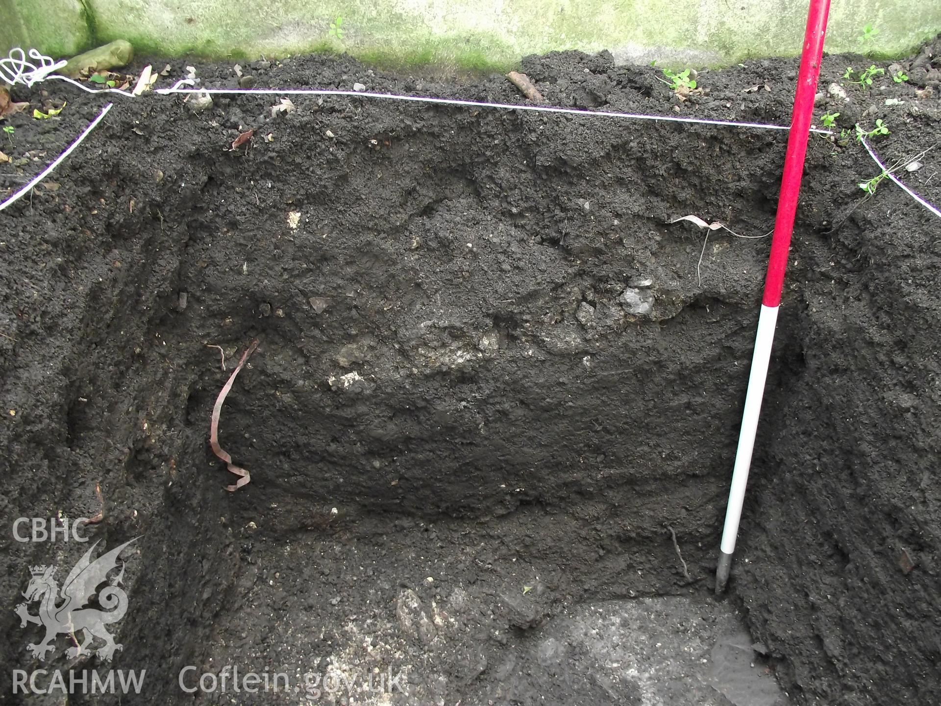 Digital photograph showing excavated area at 1A White Hart Lane and 30 High Street (Bank House), Caerleon. Produced by M. Lewis, National Roman Legion Museum. August 2012.