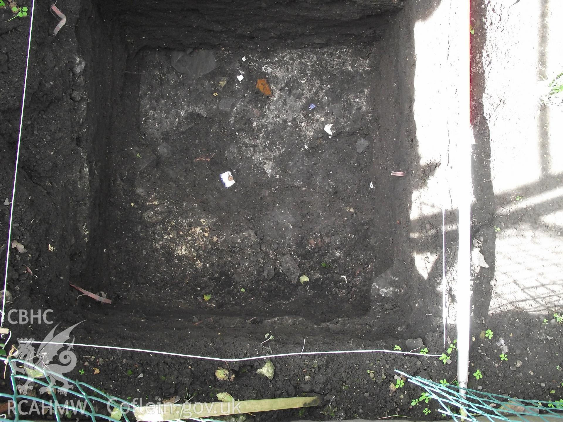 Digital photograph showing excavated area at 1A White Hart Lane and 30 High Street (Bank House), Caerleon. Produced by M. Lewis, National Roman Legion Museum. August 2012.