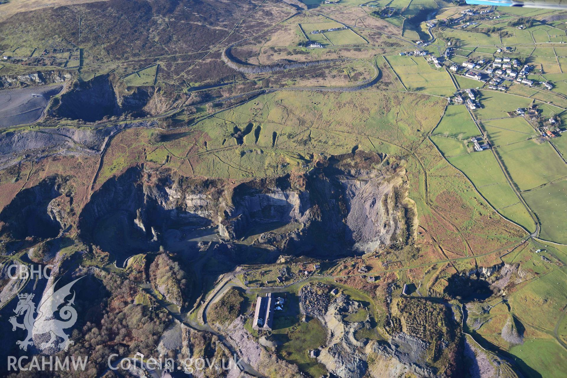 Oblique aerial photograph of Pen-yr-Orsedd slate quarry and blondins, taken from the south east during the Royal Commission’s programme of archaeological aerial reconnaissance by Toby Driver on 12th January 2022