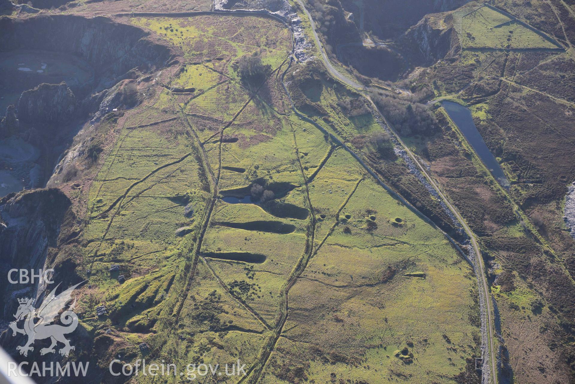 Oblique aerial photograph of Pen-yr-Orsedd slate quarry and blondins, taken from the north east during the Royal Commission’s programme of archaeological aerial reconnaissance by Toby Driver on 12th January 2022