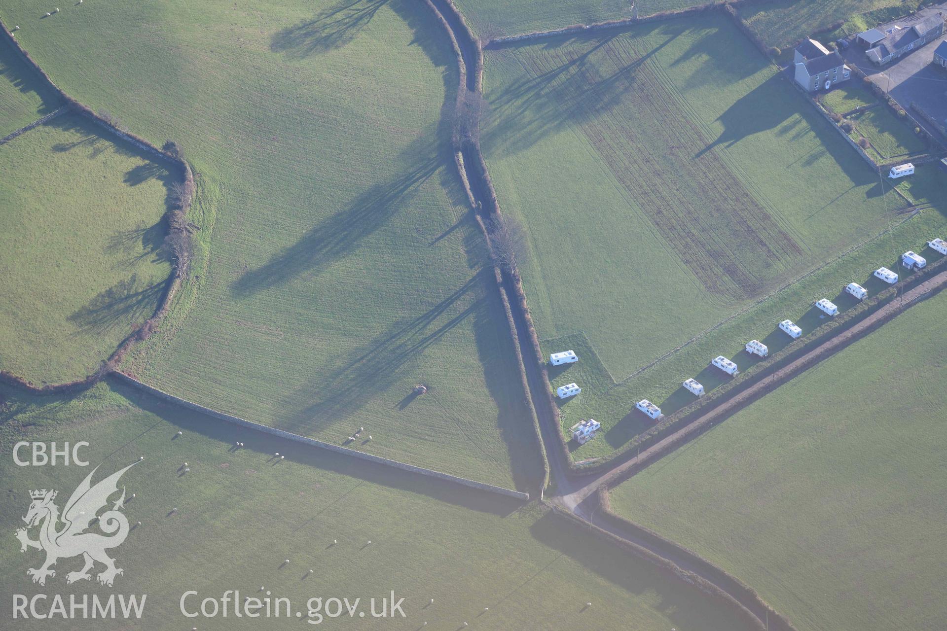 Oblique aerial photograph of Penarth Burial Chamber taken during the Royal Commission