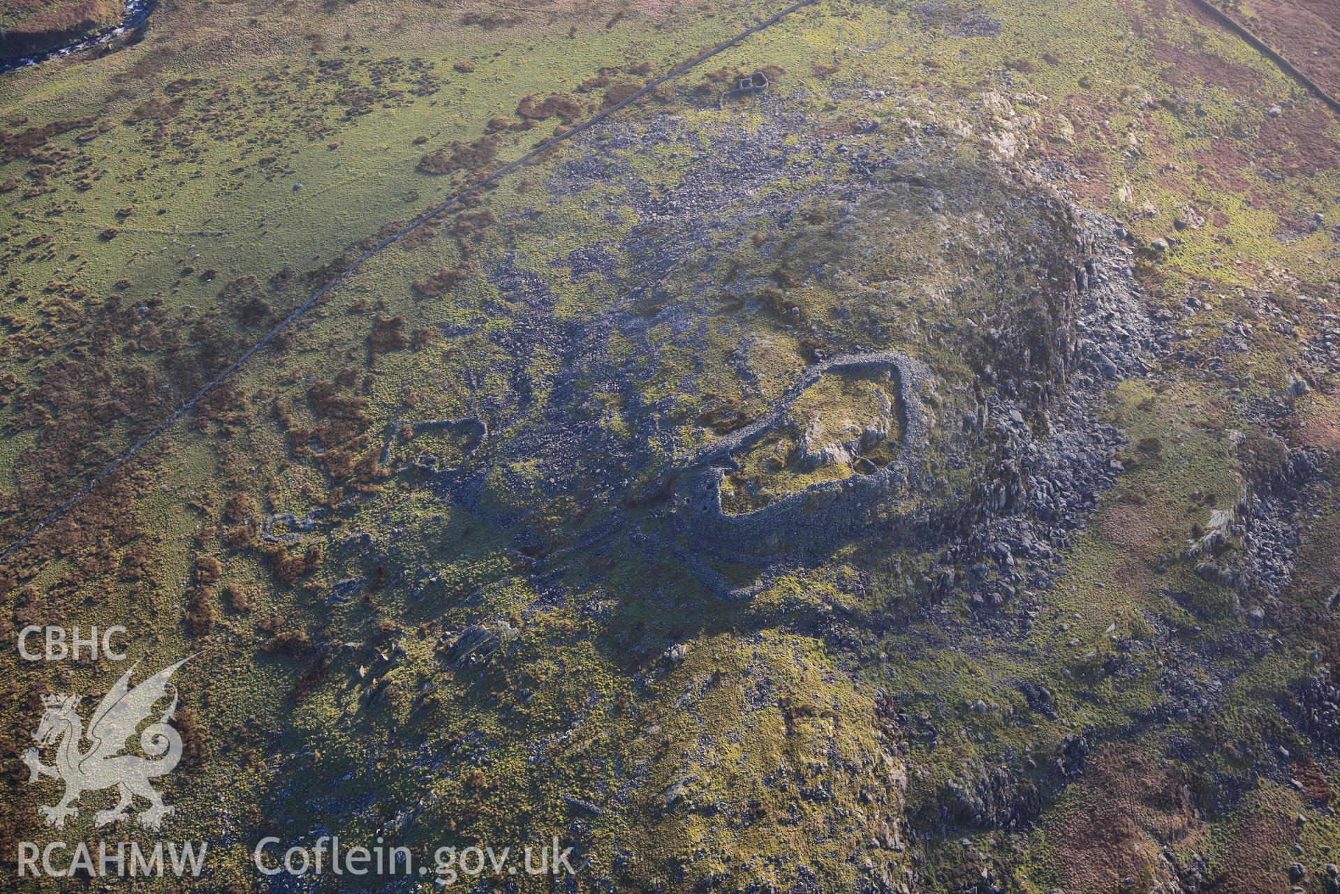 Oblique aerial photograph of Craig y Dinas hillfort and landscape, taken during the Royal Commission