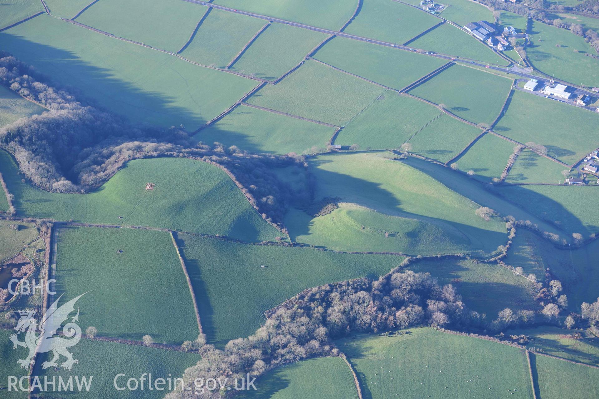 Oblique aerial photograph of Castell Mawr and Castell Bach, Llanrhystud taken during the Royal Commission