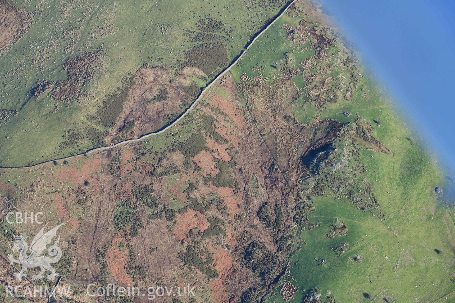 Oblique aerial photograph of small hillfort north east of Gelli Ffrydiau, Nantlle taken during the Royal Commission