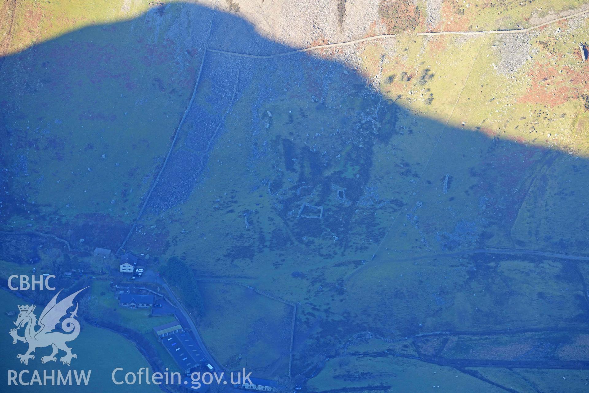 Oblique aerial photograph of Drws y Coed prehistoric settlement taken during the Royal Commission