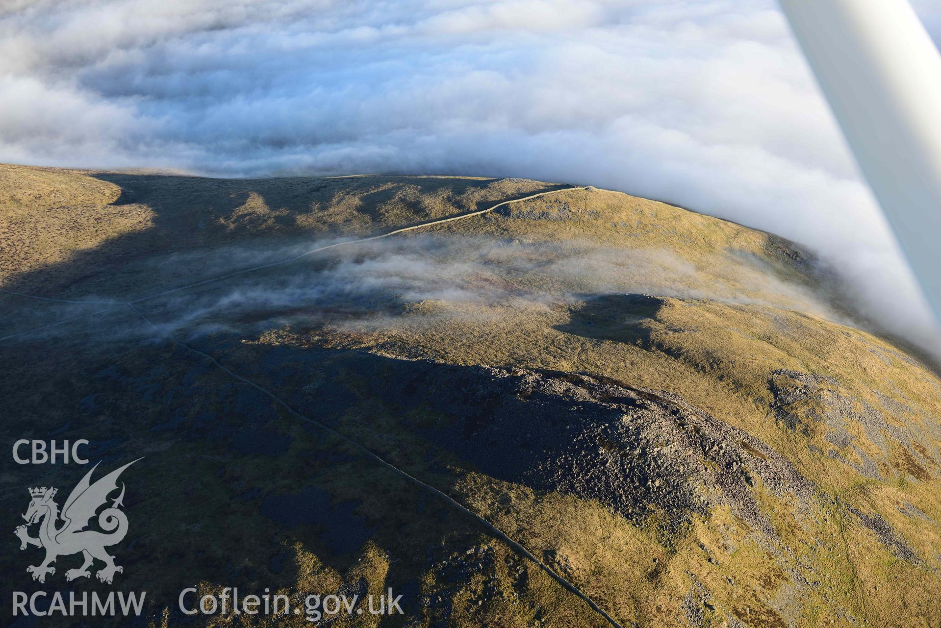 Oblique aerial photograph of the Gyrn Ddu cairns taken from the west during the Royal Commission