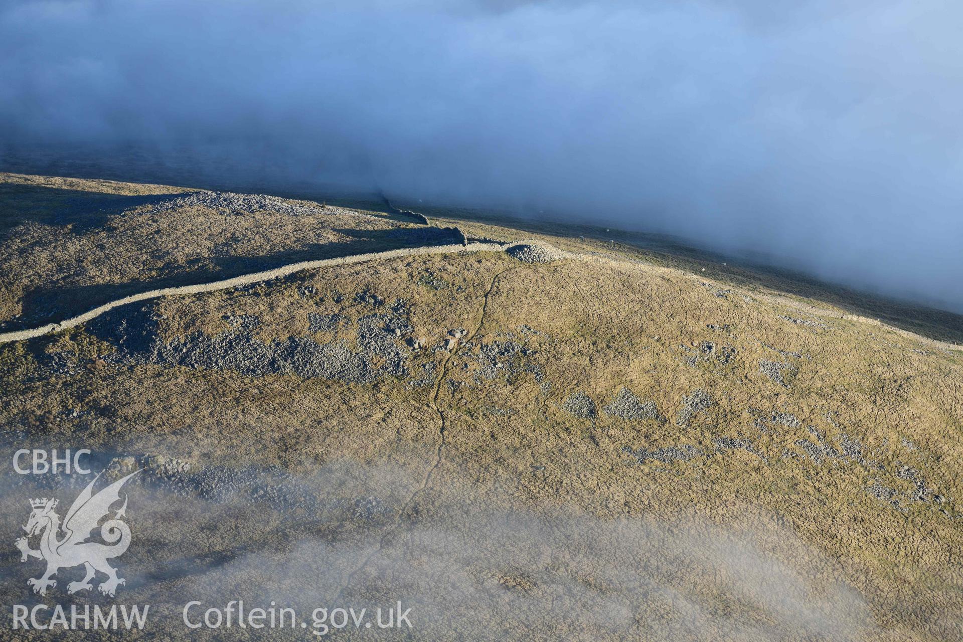 Oblique aerial photograph of the Gyrn Ddu cairns taken during the Royal Commission