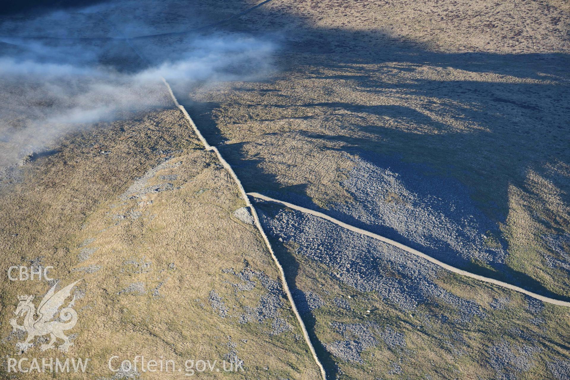 Oblique aerial photograph of the Gyrn Ddu cairns taken during the Royal Commission