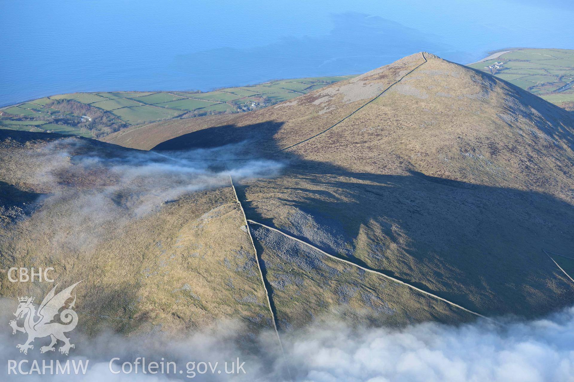 Oblique aerial photograph of the Gyrn Ddu cairns taken during the Royal Commission