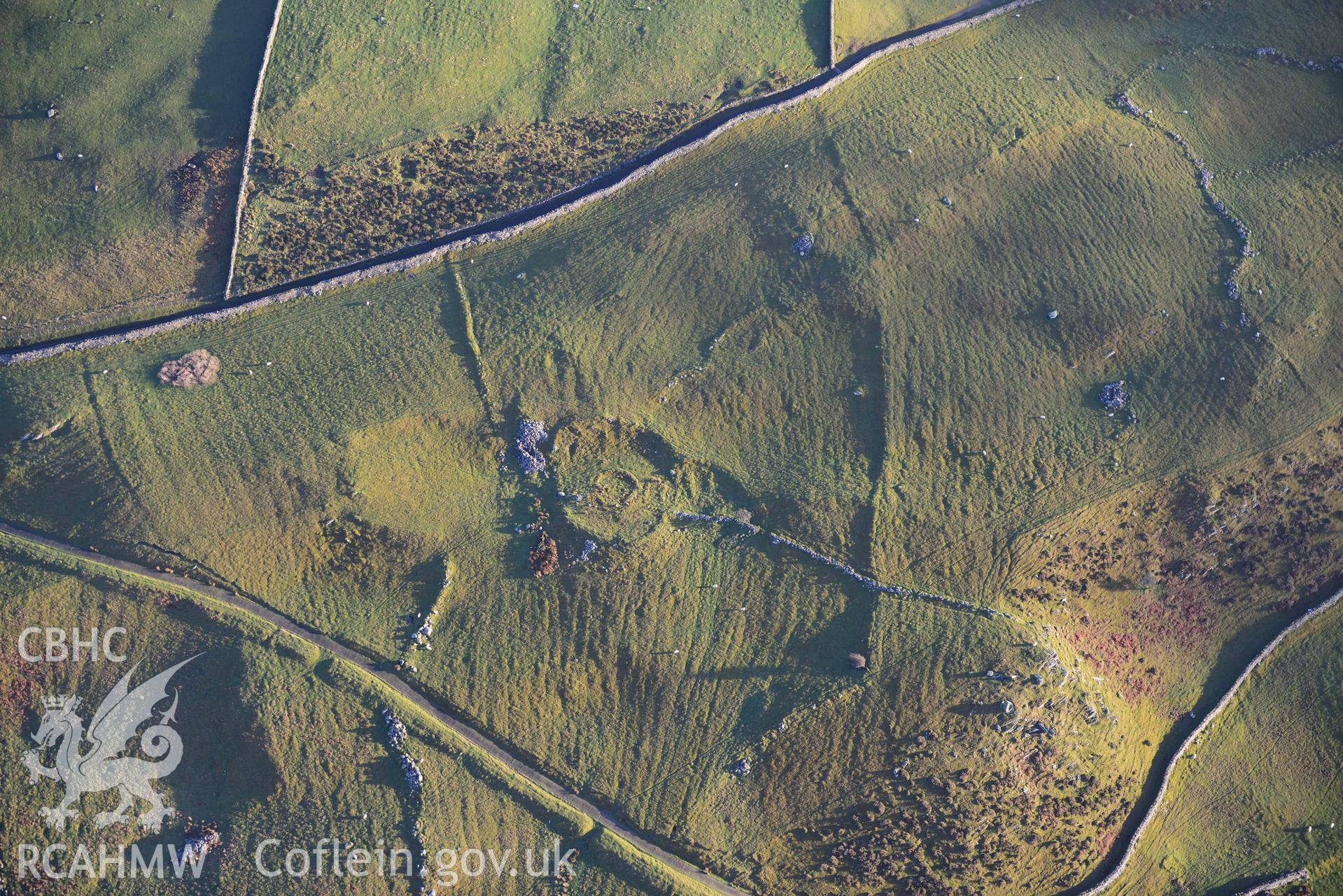 Oblique aerial photograph of Erw Wen prehistoric and medieval settlement, and fields. Taken during the Royal Commission