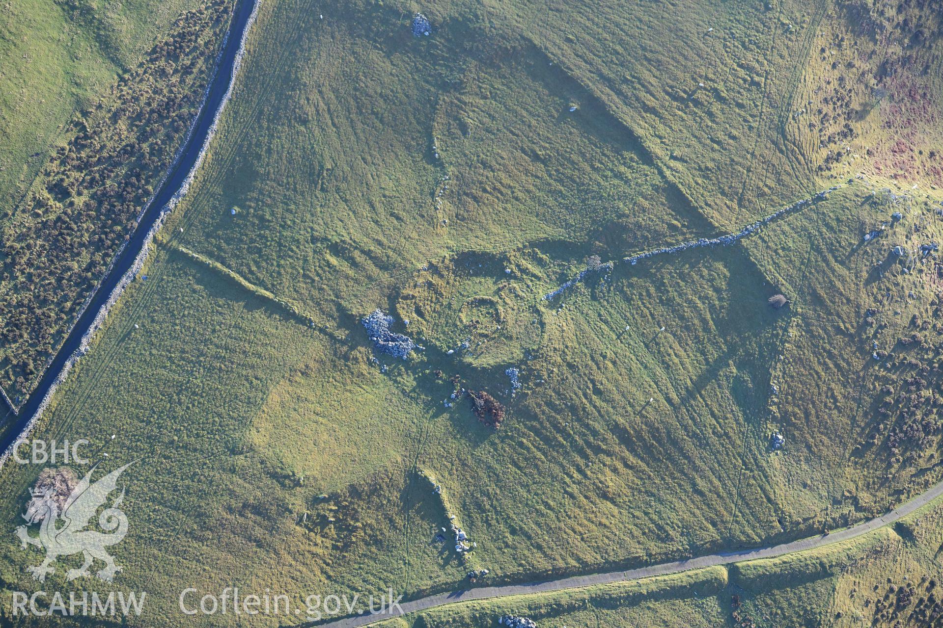 Oblique aerial photograph of Erw Wen prehistoric and medieval settlement, and fields. Taken during the Royal Commission