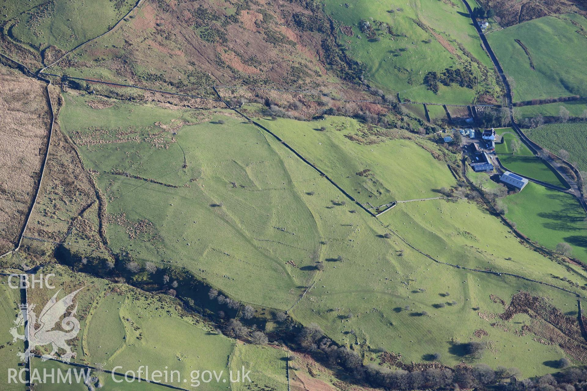 Oblique aerial photograph of Gelliffrydiau homestead and field systems. Taken during the Royal Commission