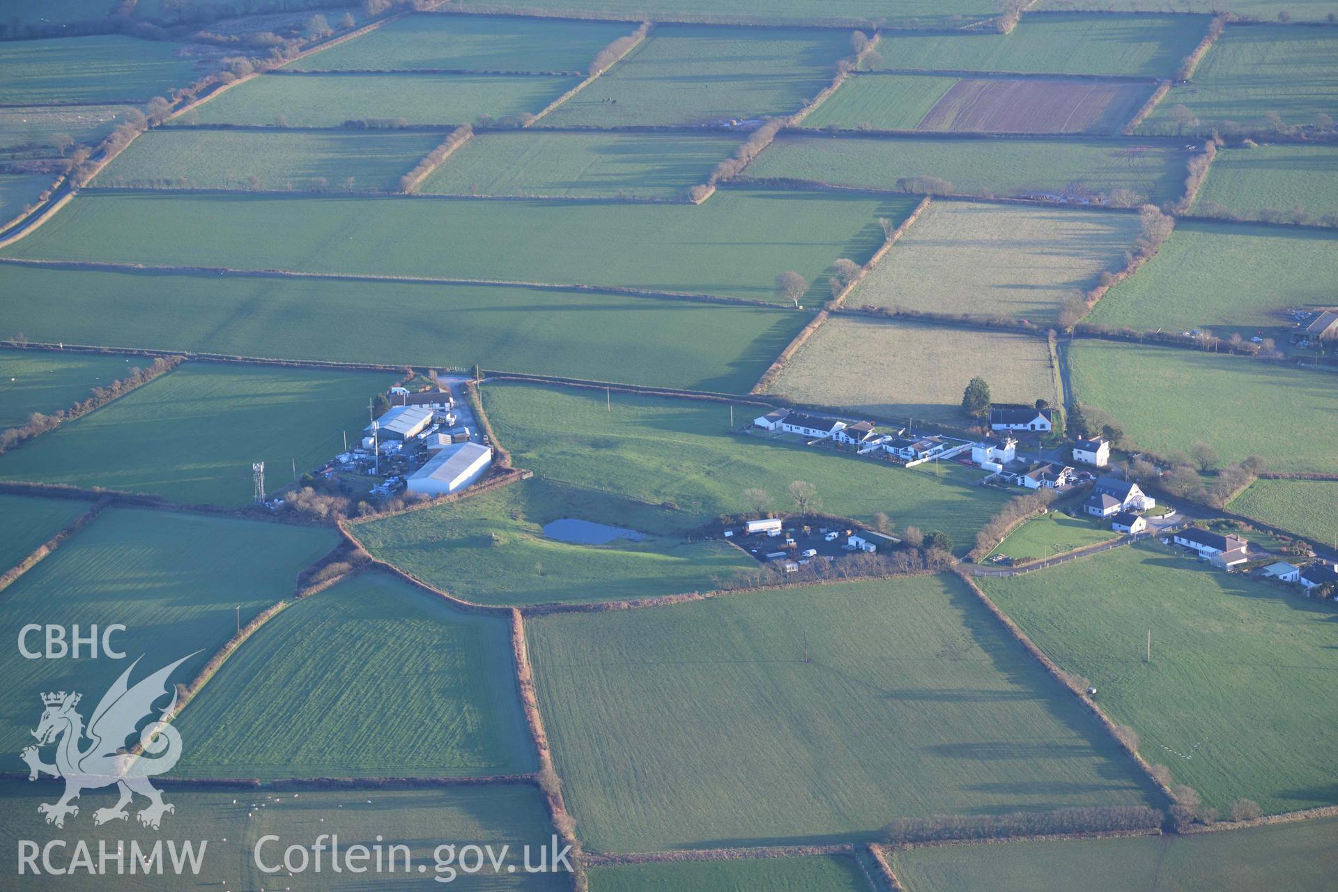 Oblique aerial photograph of Caer Pwntan taken during the Royal Commission