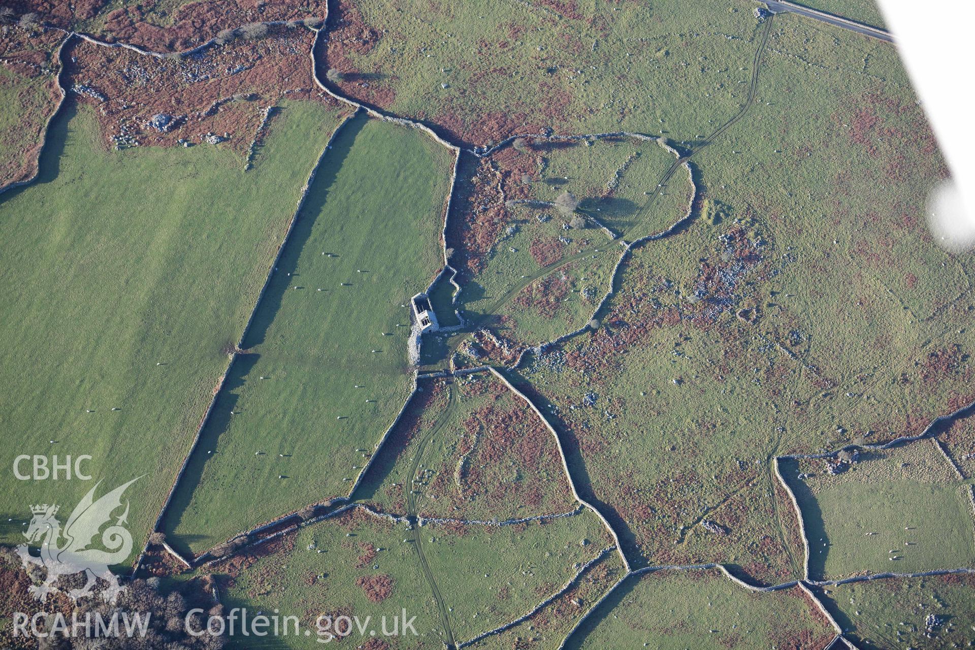 Oblique aerial photograph of Muriau'r Gwyddelod, settlement complex, enclosures at SH588301. Taken during the Royal Commission