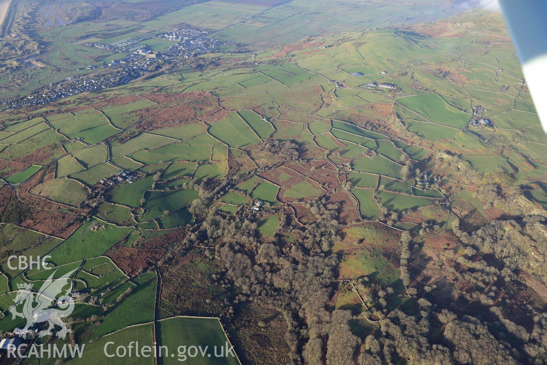 Oblique aerial photograph of Muriau'r Gwyddelod, settlement complex, wide landscape view from south. Taken during the Royal Commission