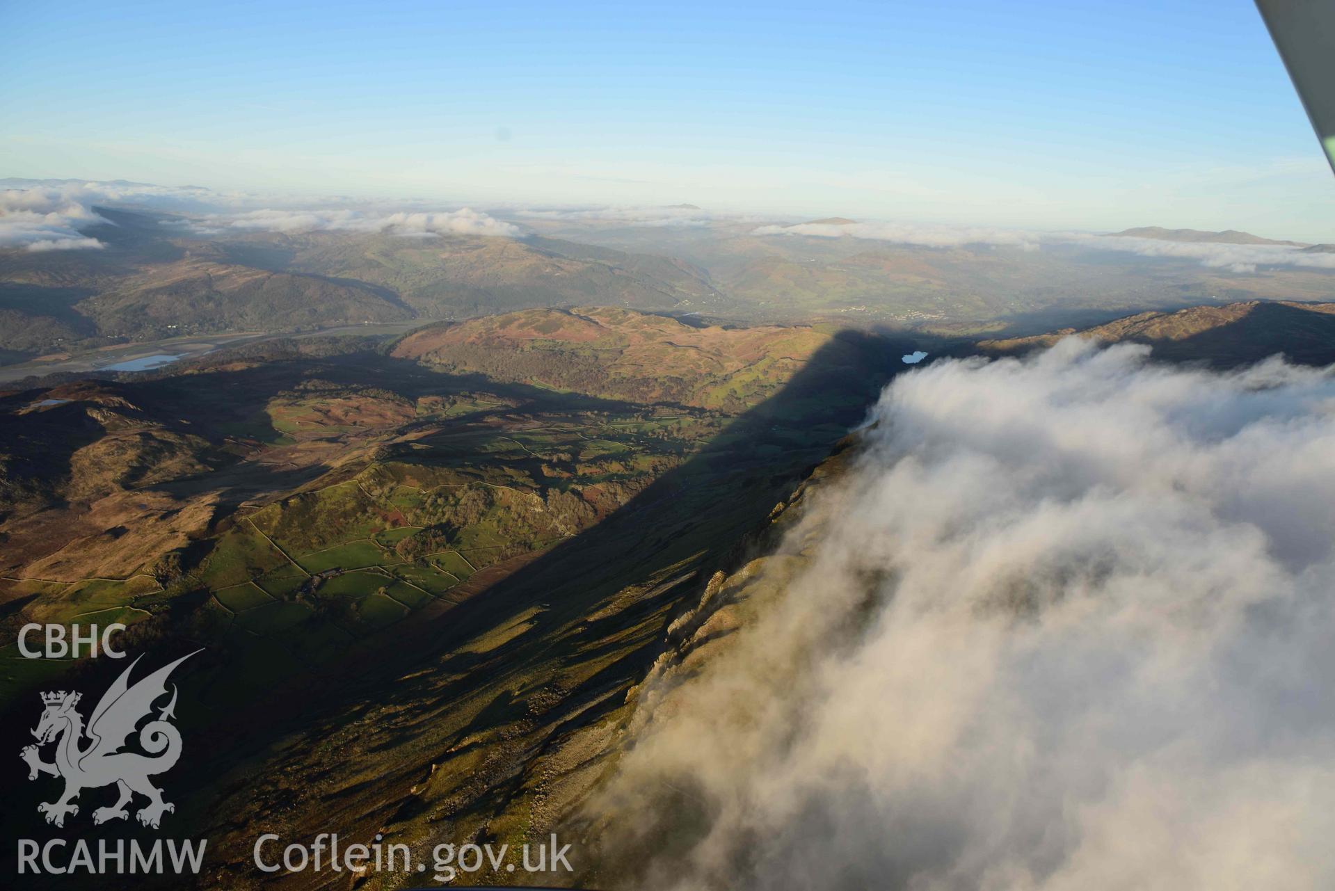 Oblique aerial photograph of Cader Idris, with cloud inversion, view along ridge from West. Taken during the Royal Commission