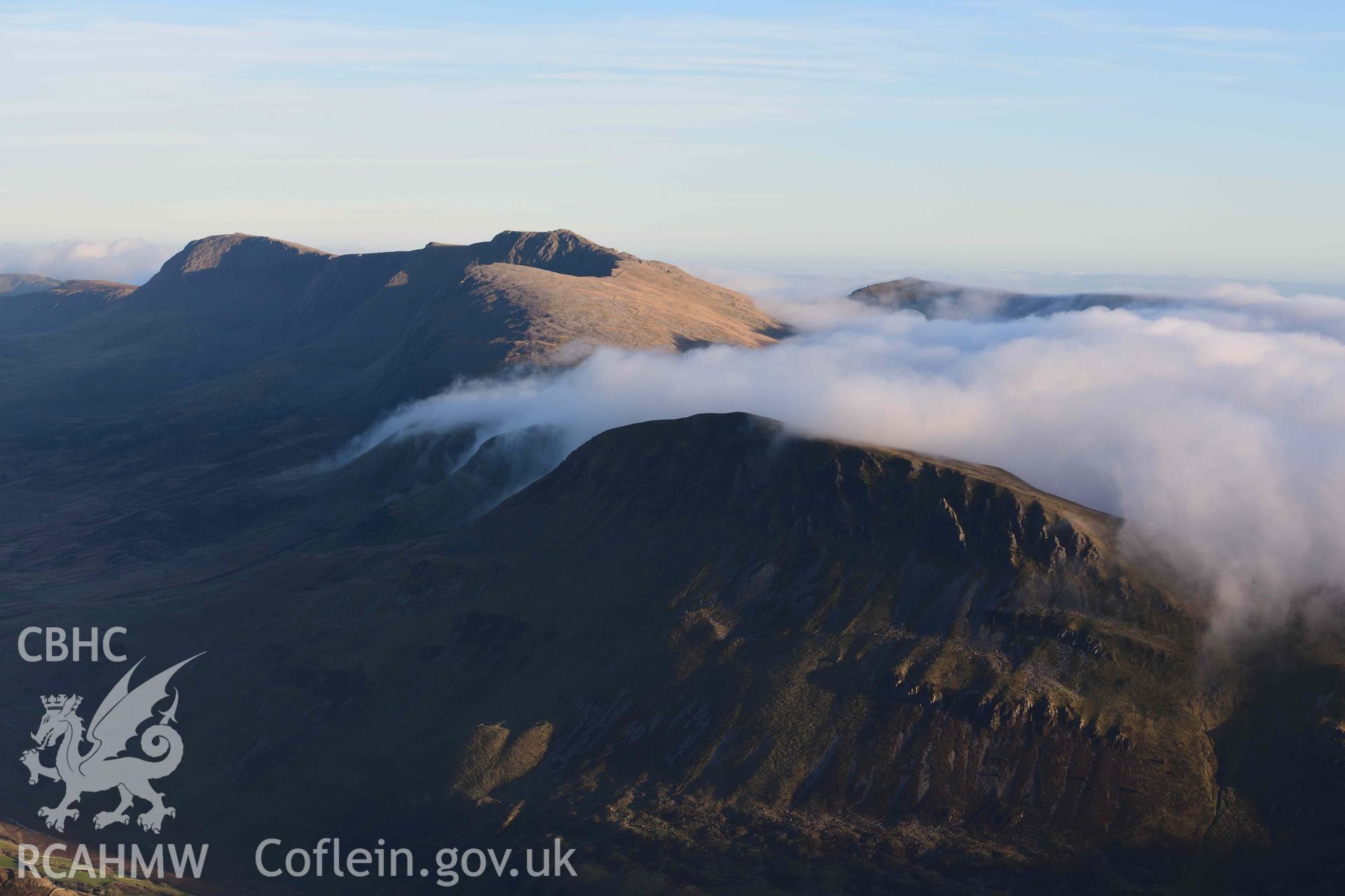 Oblique aerial photograph of Cader Idris, with cloud inversion, view from West. Taken during the Royal Commission