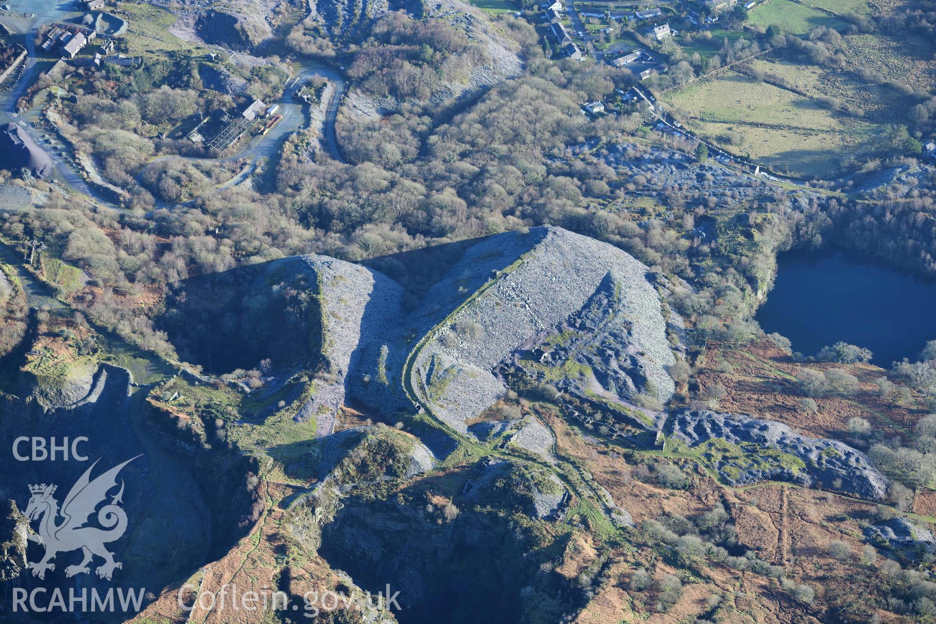 Oblique aerial photograph of Pen y Bryn slate quarry taken during the Royal Commission