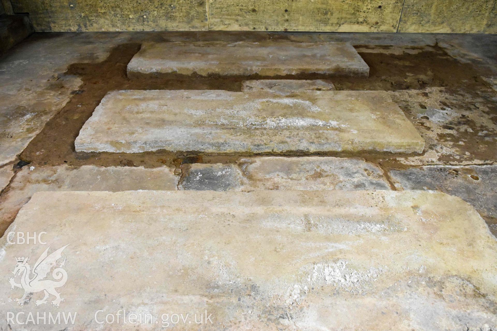 Basement room on east side of building, detail of floor.
