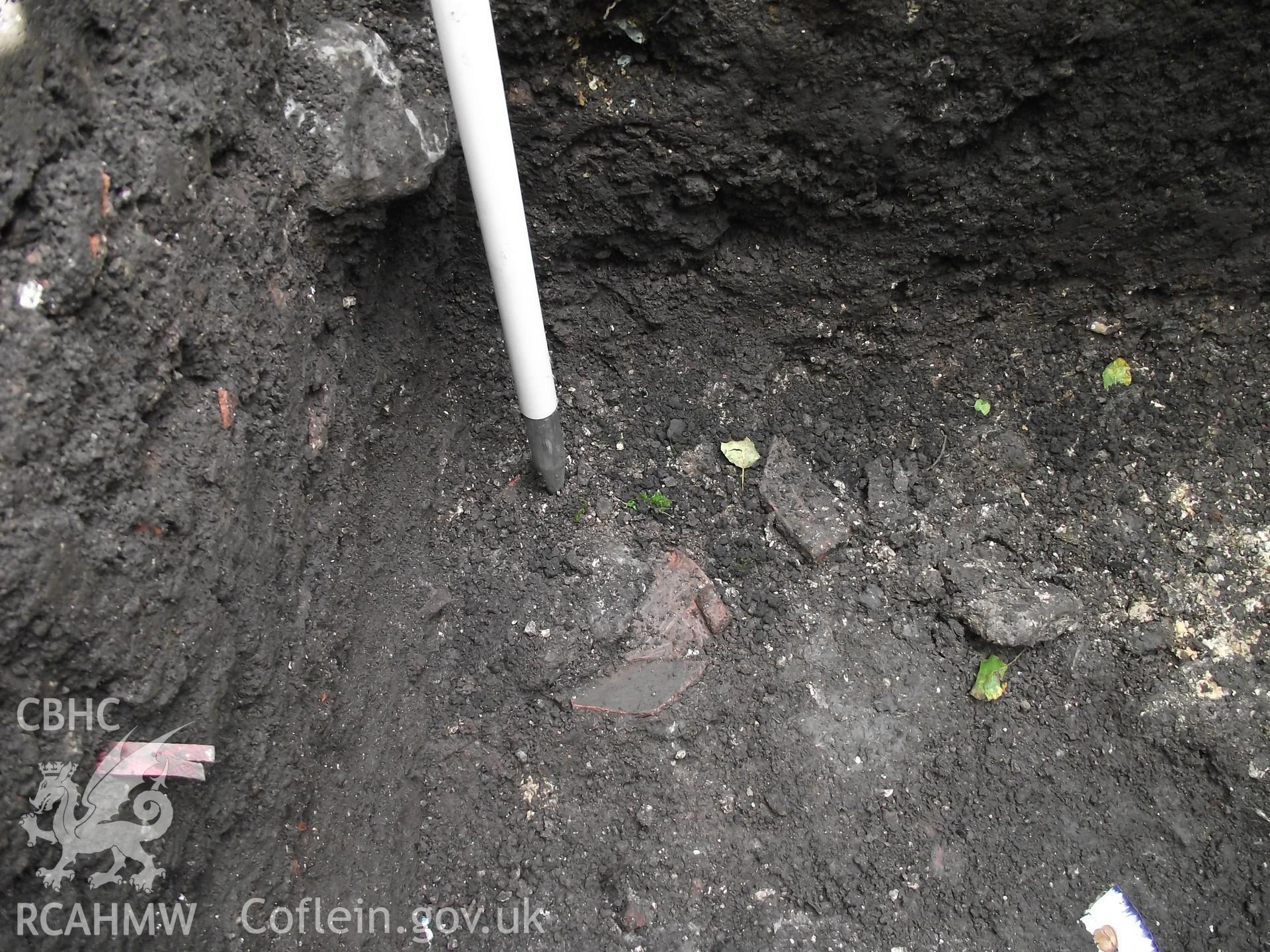 Digital photograph showing excavated area at 1A White Hart Lane and 30 High Street (Bank House), Caerleon. Produced by M. Lewis, National Roman Legion Museum. August 2012.