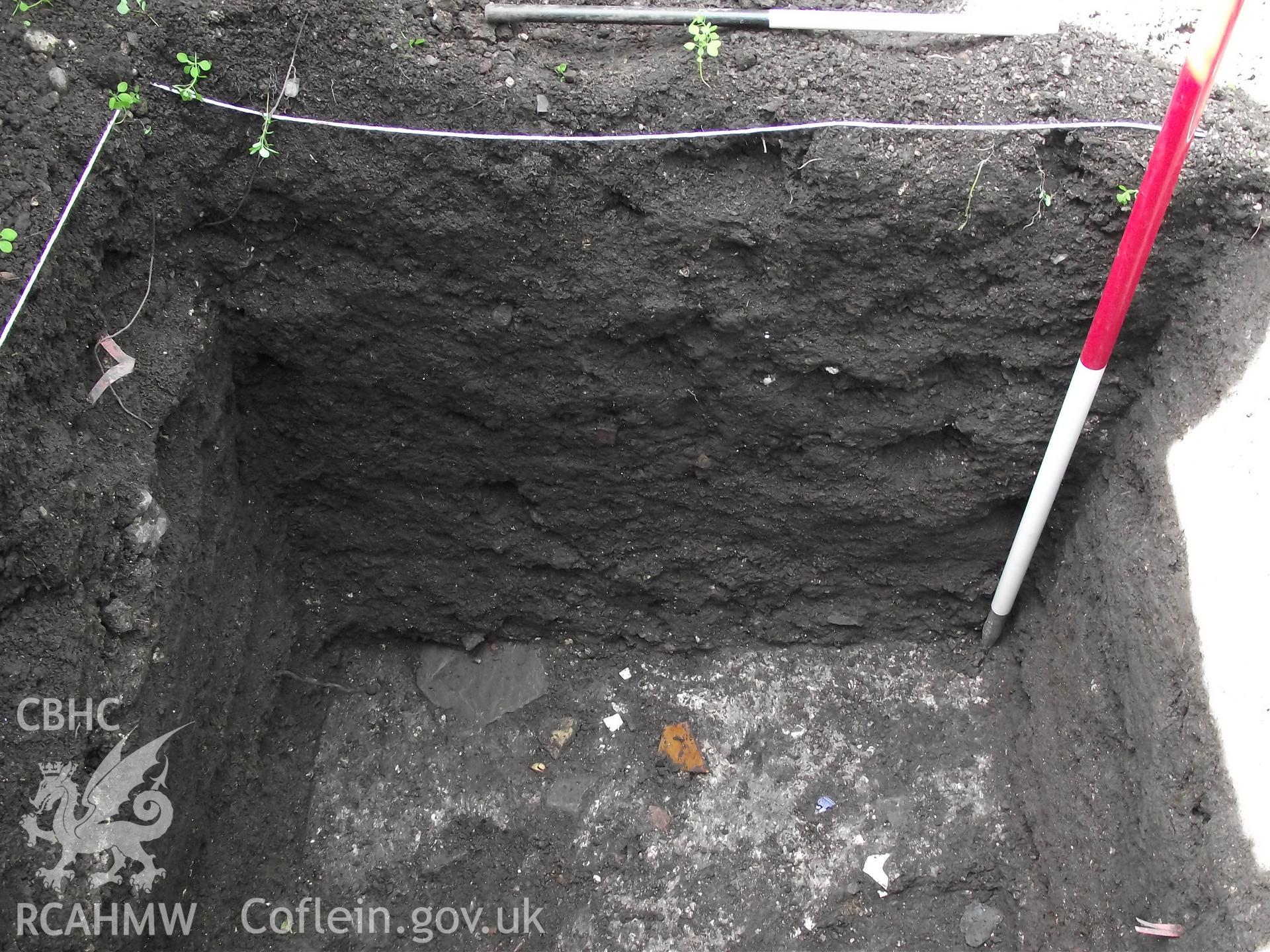 Digital photograph showing excavated area at 1A White Hart Lane and 30 High Street (Bank House), Caerleon. Produced by M. Lewis, National Roman Legion Museum. August 2012.