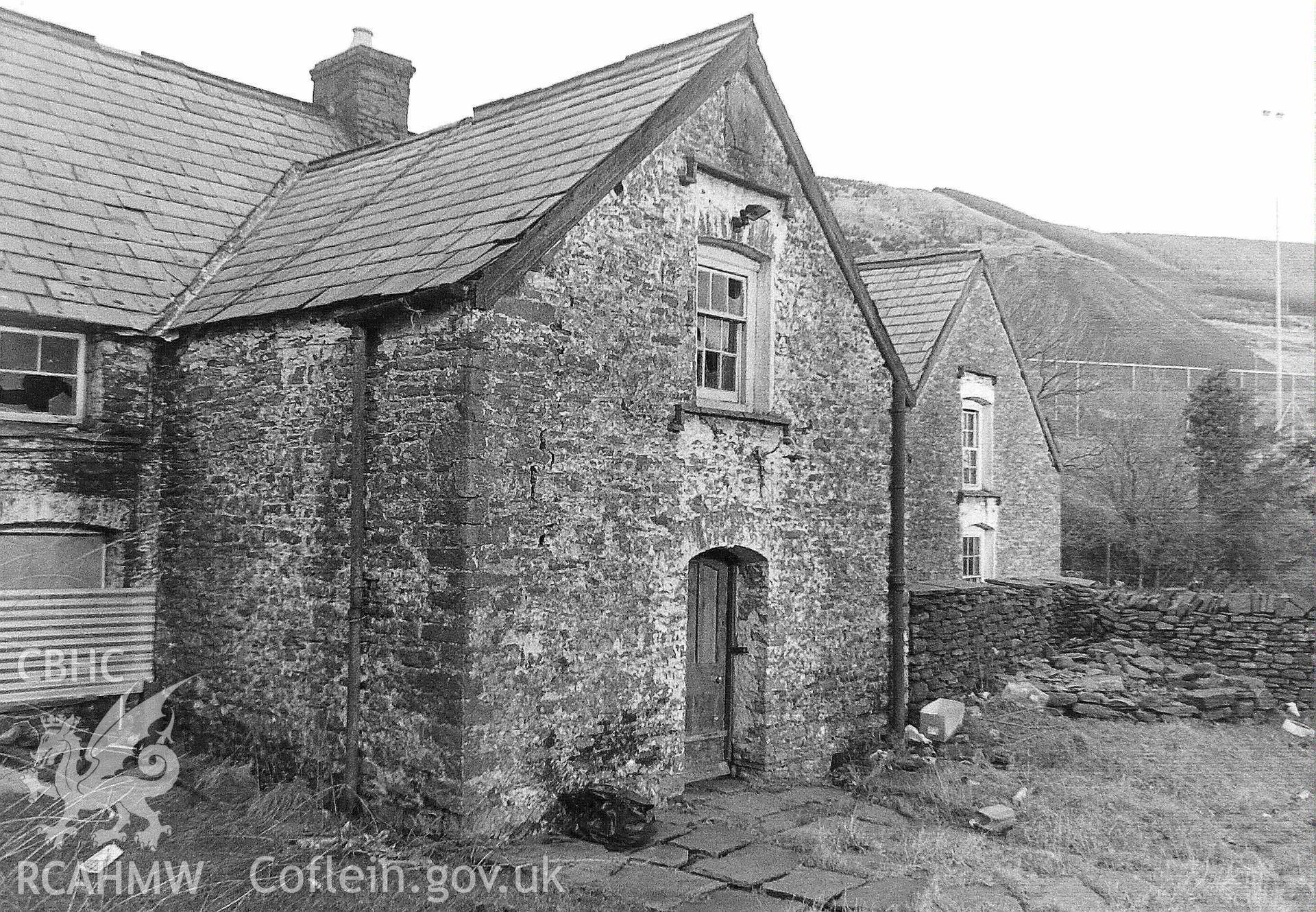 Digitised black and white photograph showing exterior of Tynewydd, Treherbert, before restoration. Produced by Paul Davis in 1984