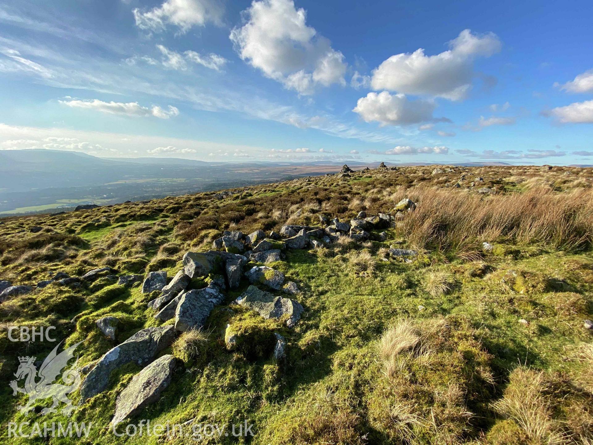 Digital photograph showing landscape around Buarth Maen settlement remains, produced by Paul Davis in 2020