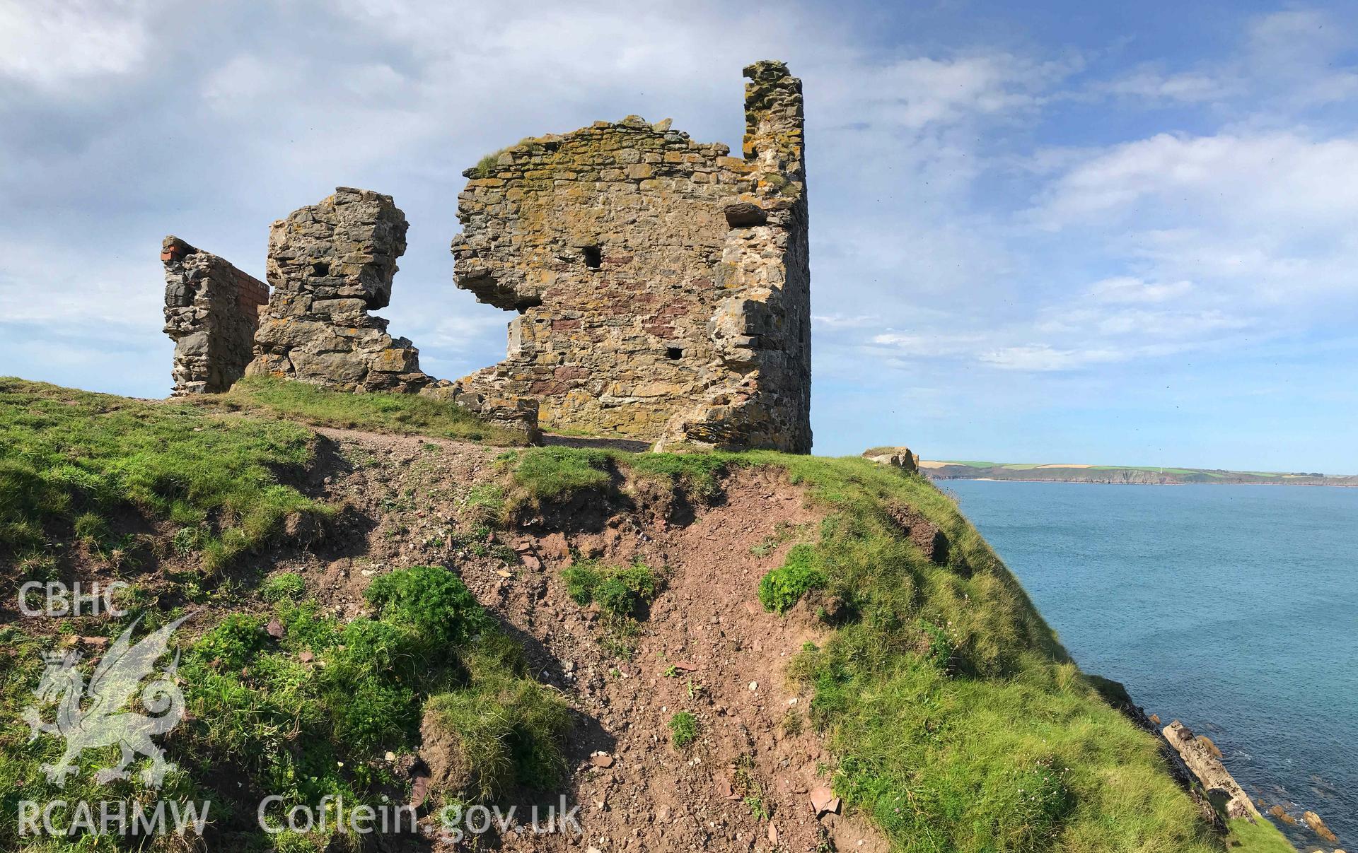 Digitised photograph showing remains of wall at East Blockhouse, Angle. Produced by Paul Davis in 2020