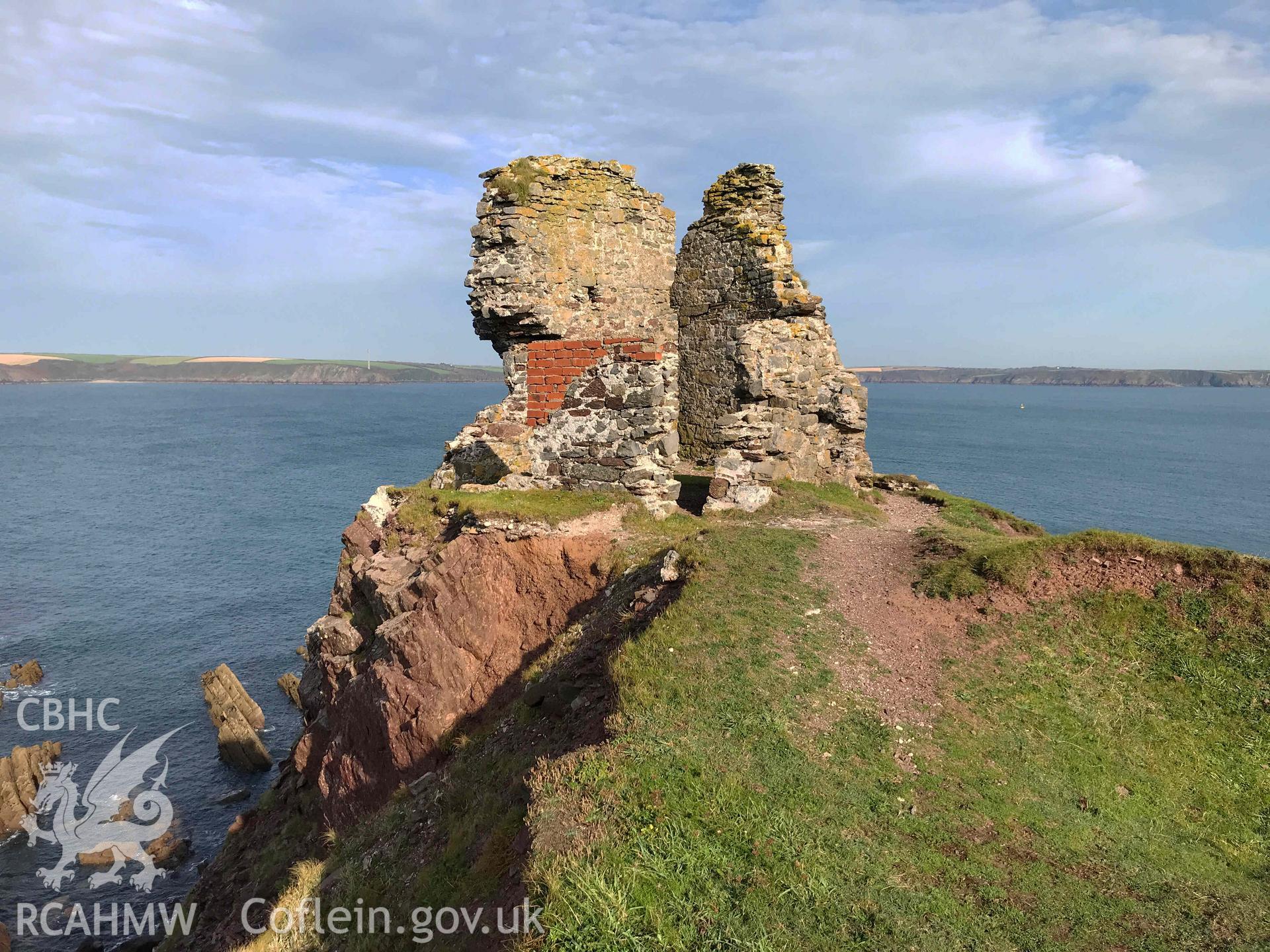 Digitised photograph showing remains of repaired wall at East Blockhouse, Angle. Produced by Paul Davis in 2020