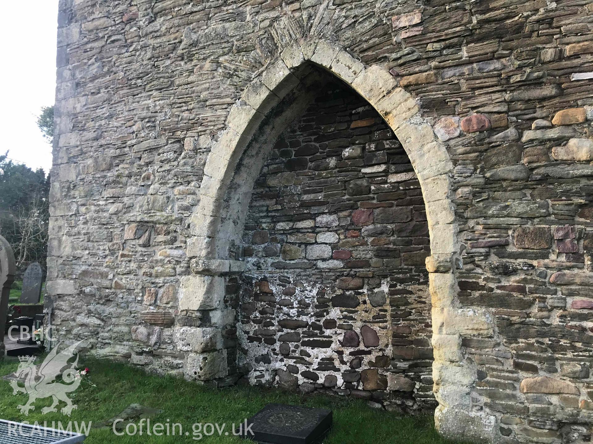 Digital photograph showing detailed view of blocked up archway at Llangyfelach church tower, produced by Paul Davis in 2020