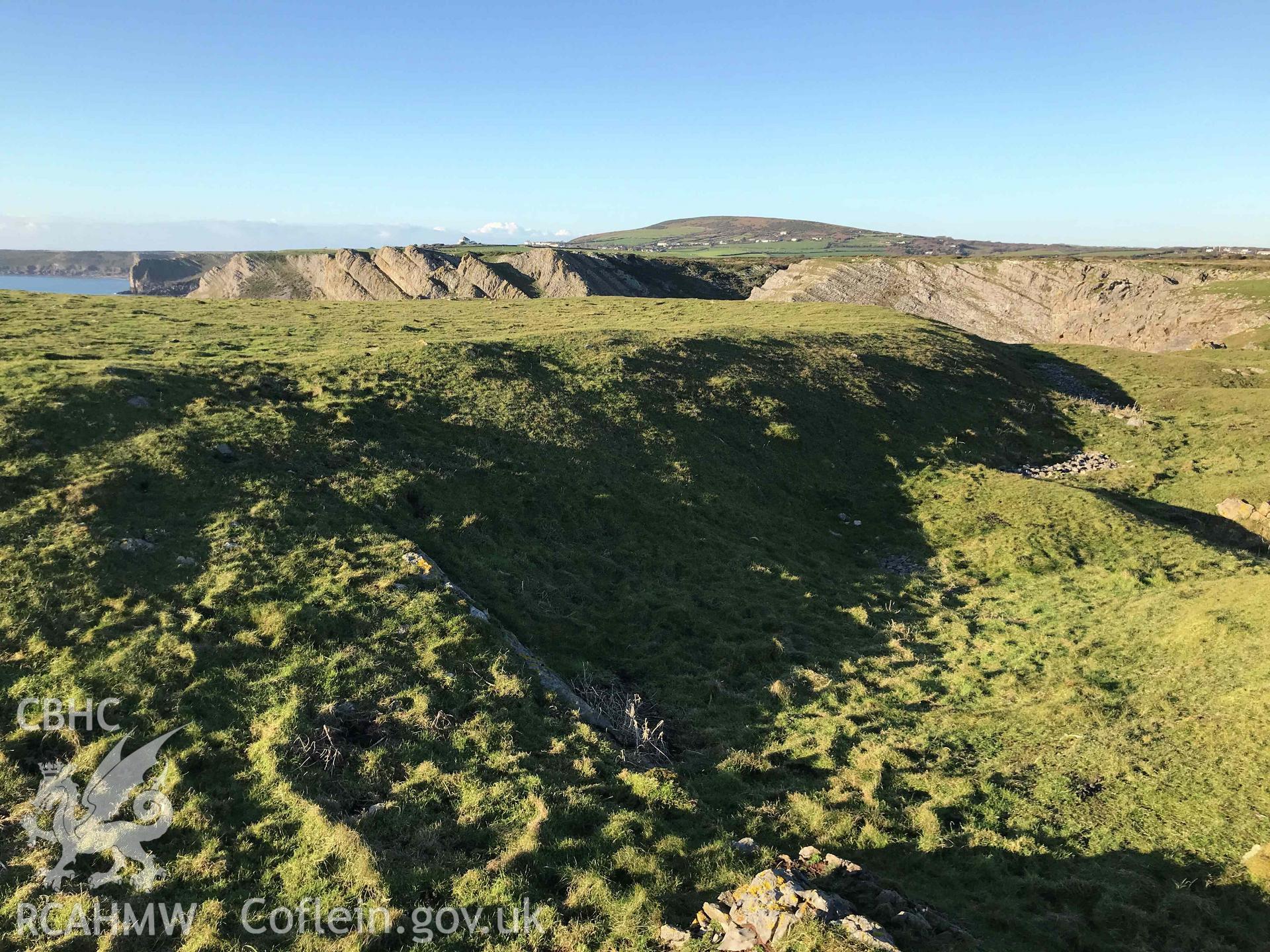 Digital photograph of outer rampart at Horse Cliff promontory fort, produced by Paul Davis in 2020