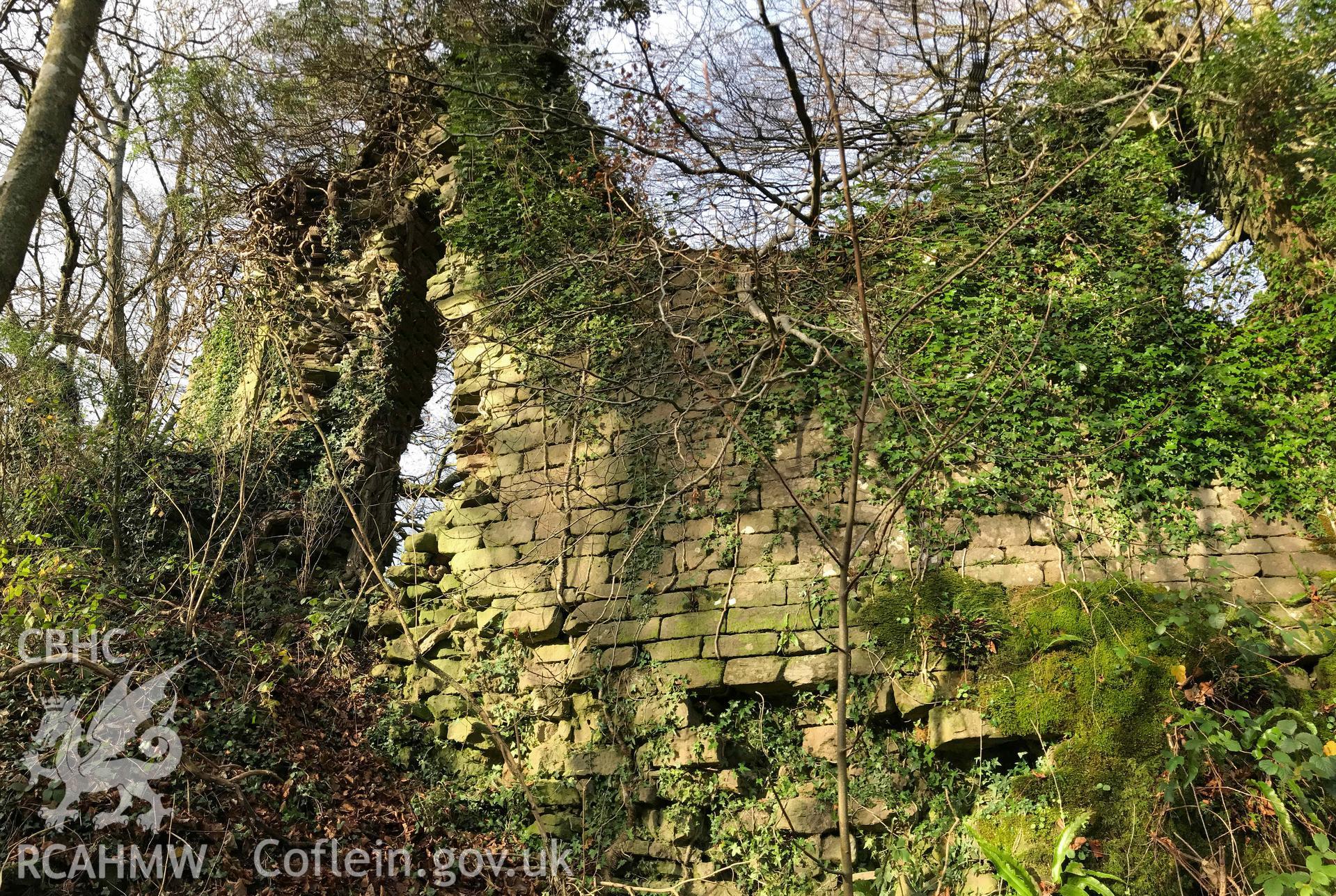 Digital photograph showing exterior wall of hall at Cas Troggy Castle, produced by Paul Davis in 2020