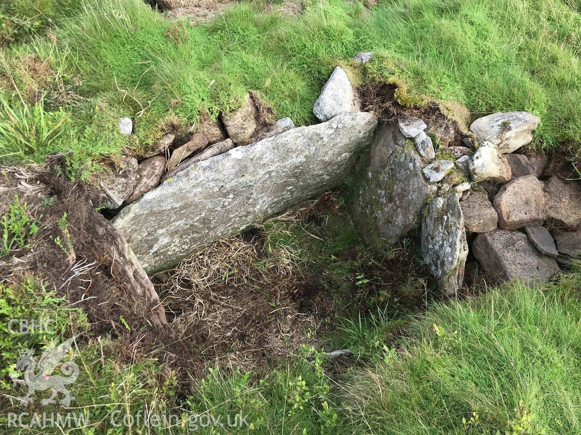 Digital photograph showing detailed view of stone slabs at Tarren Maerdy cairn, produced by Paul Davis in 2020