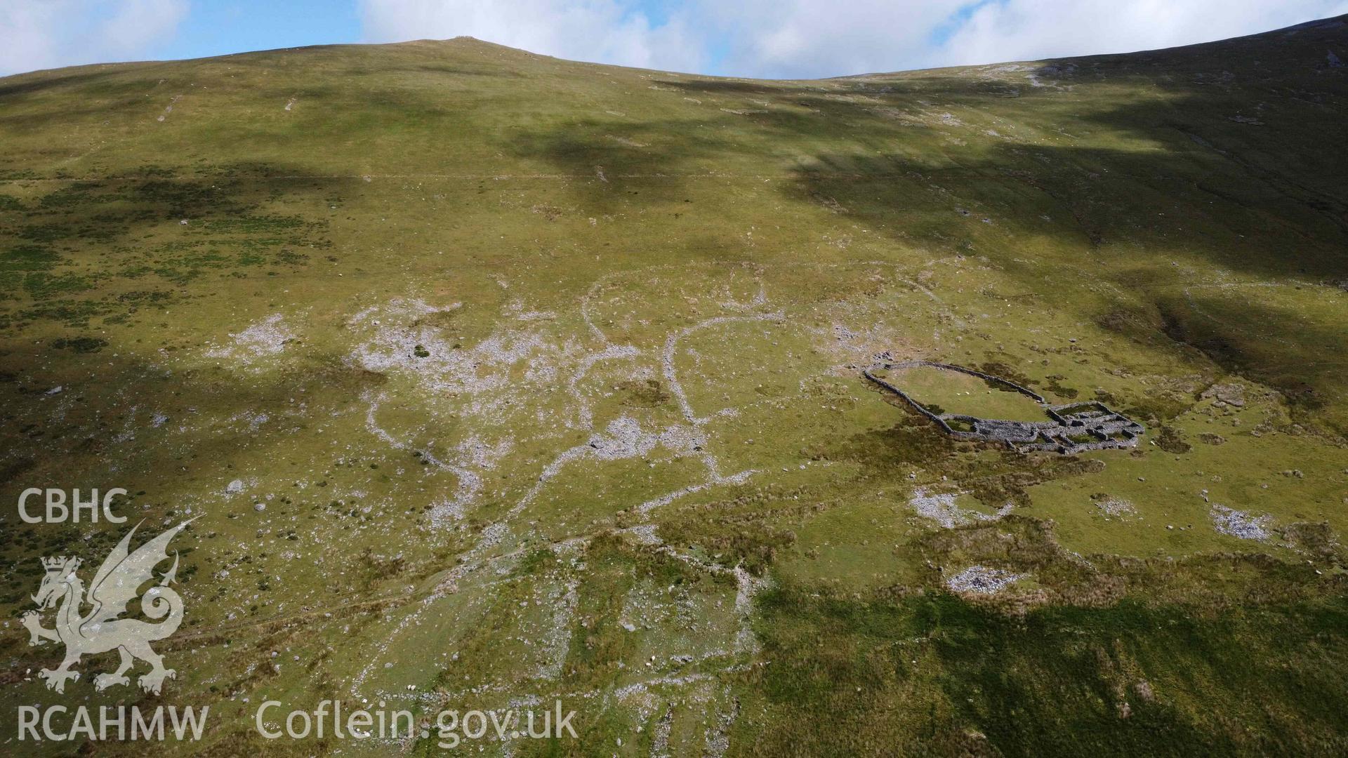 Digital aerial photograph showing Cwm Caseg Wandering Wall Settlement, Llanllechid. Taken in June 2023 by John Rowlands.