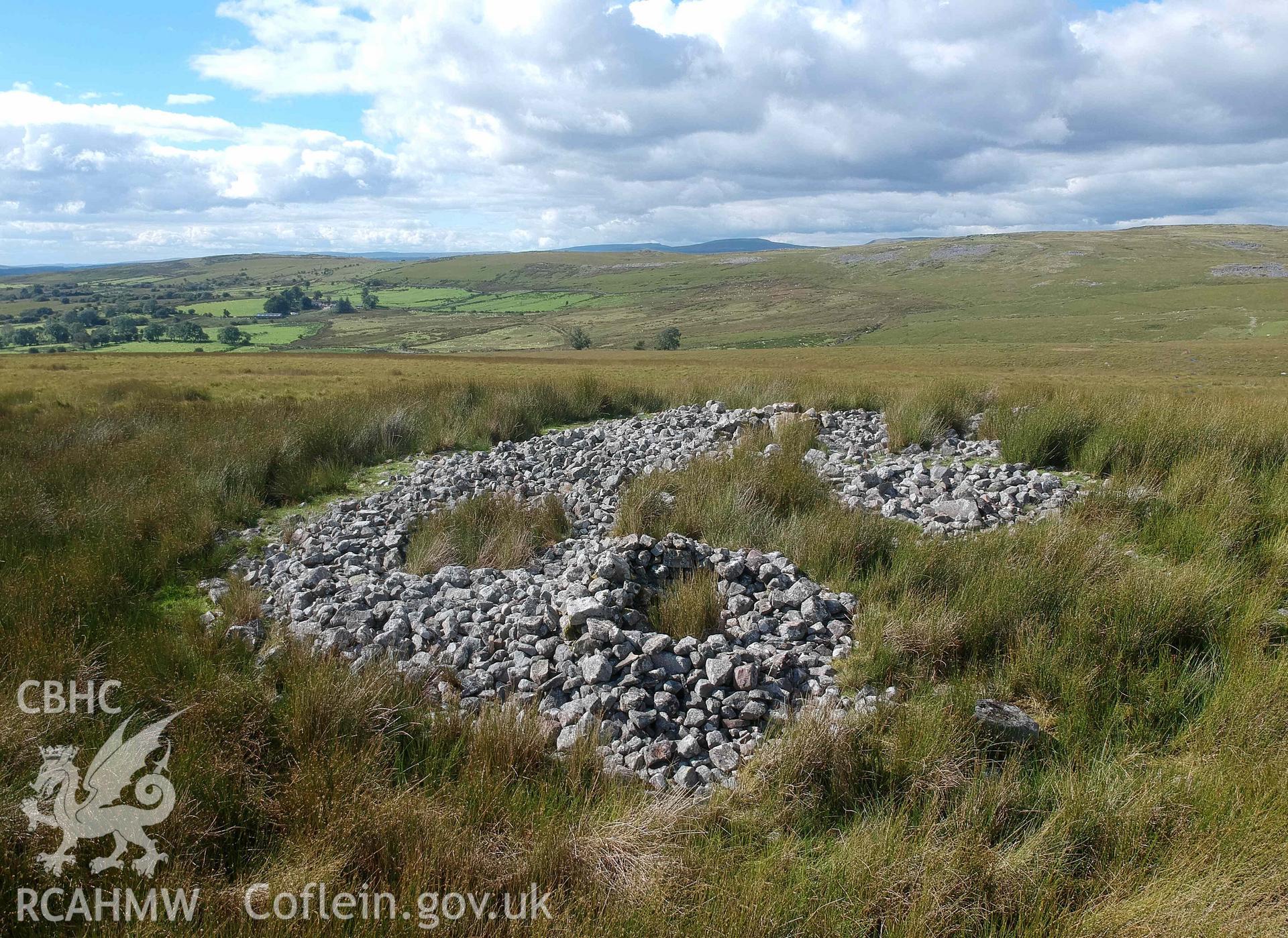 Digital photograph showing general view of cairn at Cefn Sychbant (west). Produced by Paul Davis in 2020