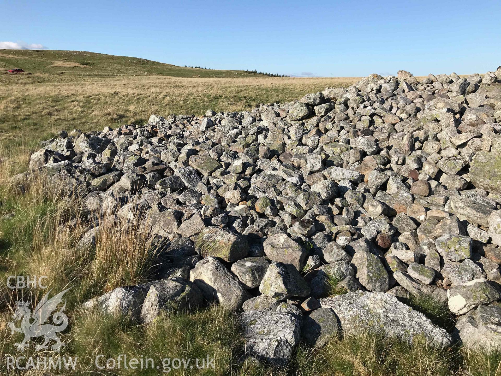 Digital photograph showing detailed view of cairn at Cefn Sychbant. Produced by Paul Davis in 2020