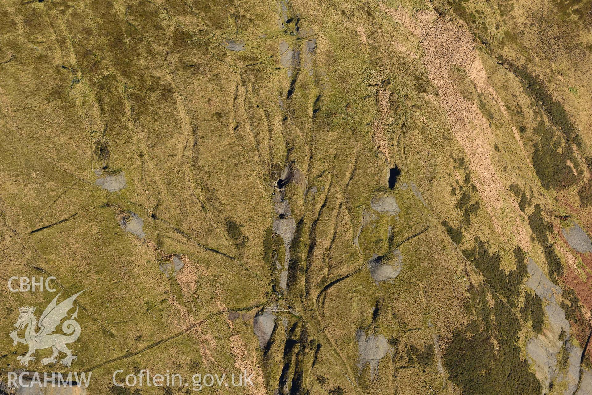 Oblique aerial photograph of Copa Hill taken during the Royal Commission’s programme of archaeological aerial reconnaissance by Toby Driver on 17th January 2022