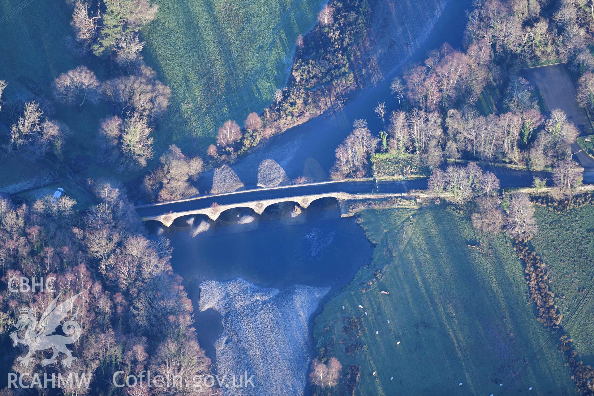 Oblique aerial photograph of Llanelltyd Bridge taken during the Royal Commission’s programme of archaeological aerial reconnaissance by Toby Driver on 17th January 2022