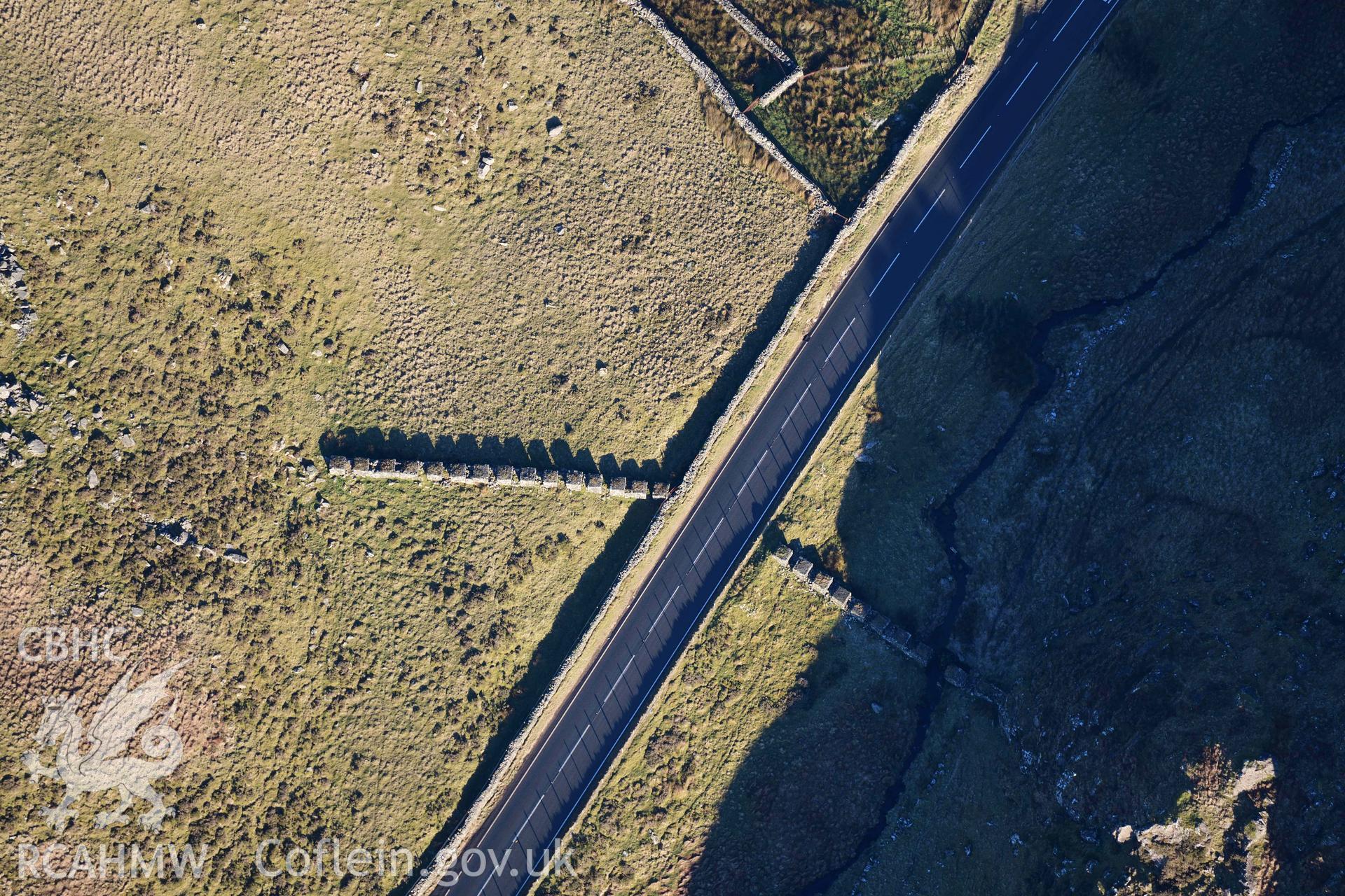 Oblique aerial photograph of Bwlch Oerddrws anti-tank blocks taken during the Royal Commission’s programme of archaeological aerial reconnaissance by Toby Driver on 17th January 2022