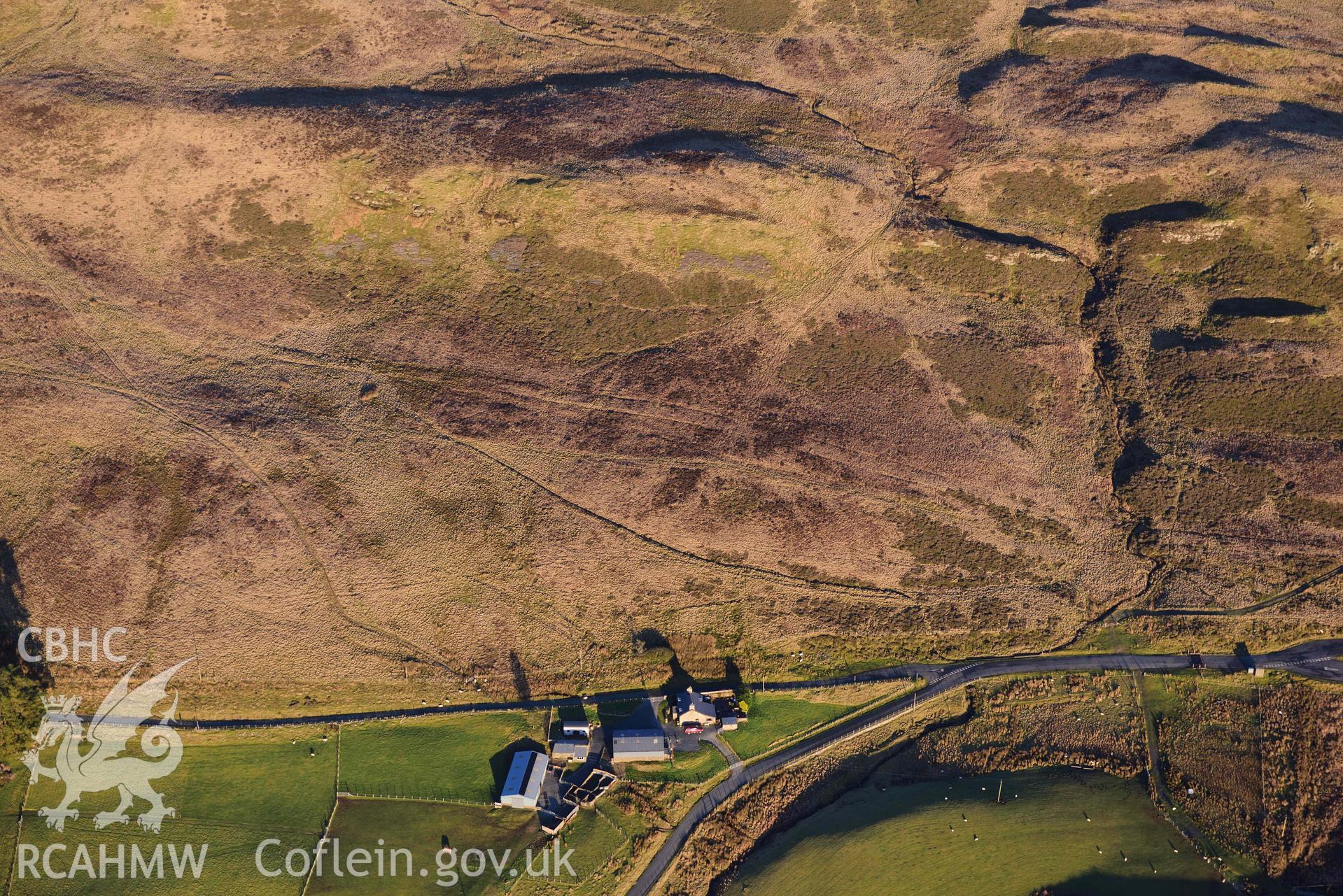 Oblique aerial photograph of Roman tile kilns east of Pen y Stryd taken during the Royal Commission’s programme of archaeological aerial reconnaissance by Toby Driver on 17th January 2022