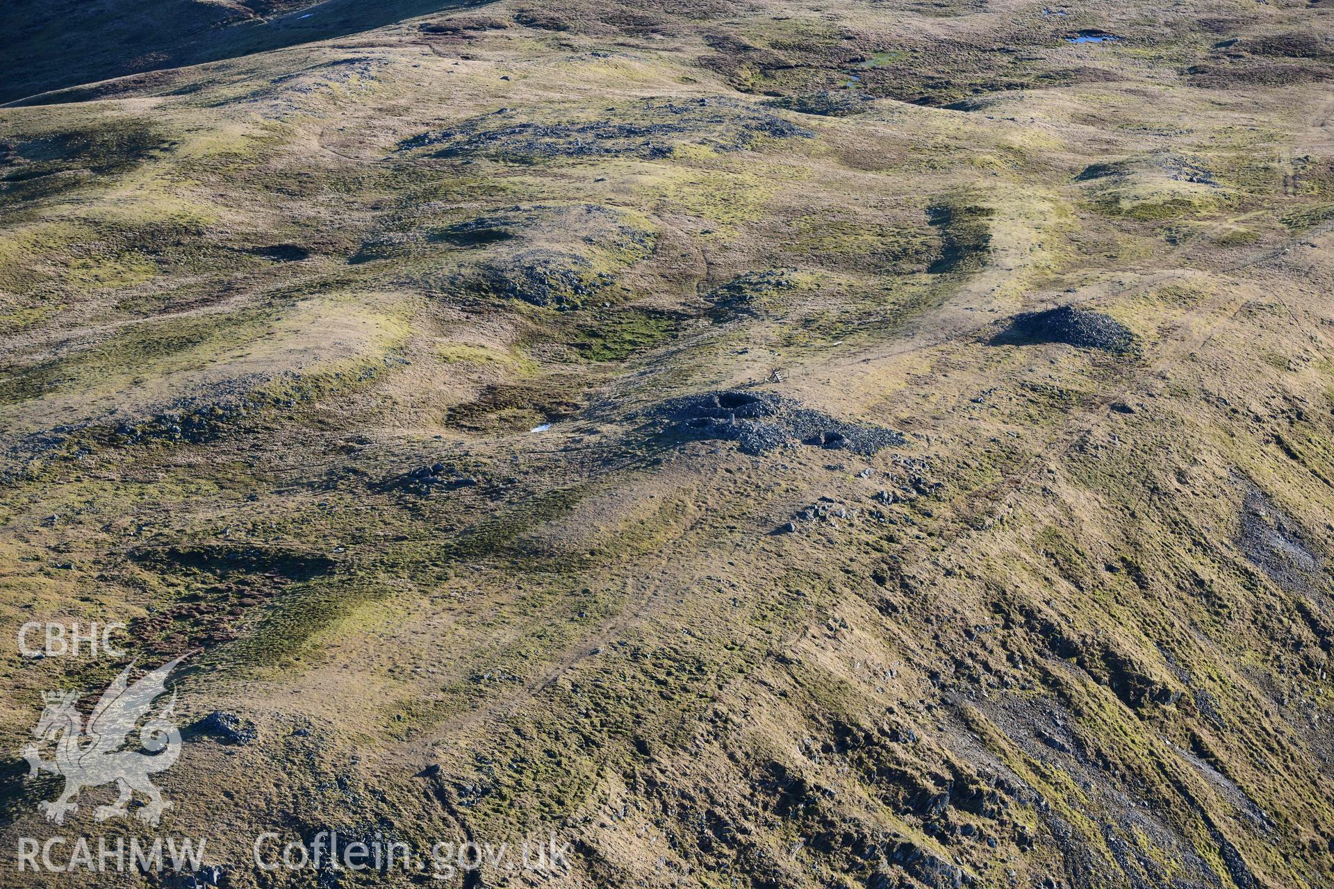 Oblique aerial photograph of Pen Plynlimon Fawr cairn cemetery. Taken during the Royal Commission’s programme of archaeological aerial reconnaissance by Toby Driver on 17th January 2022