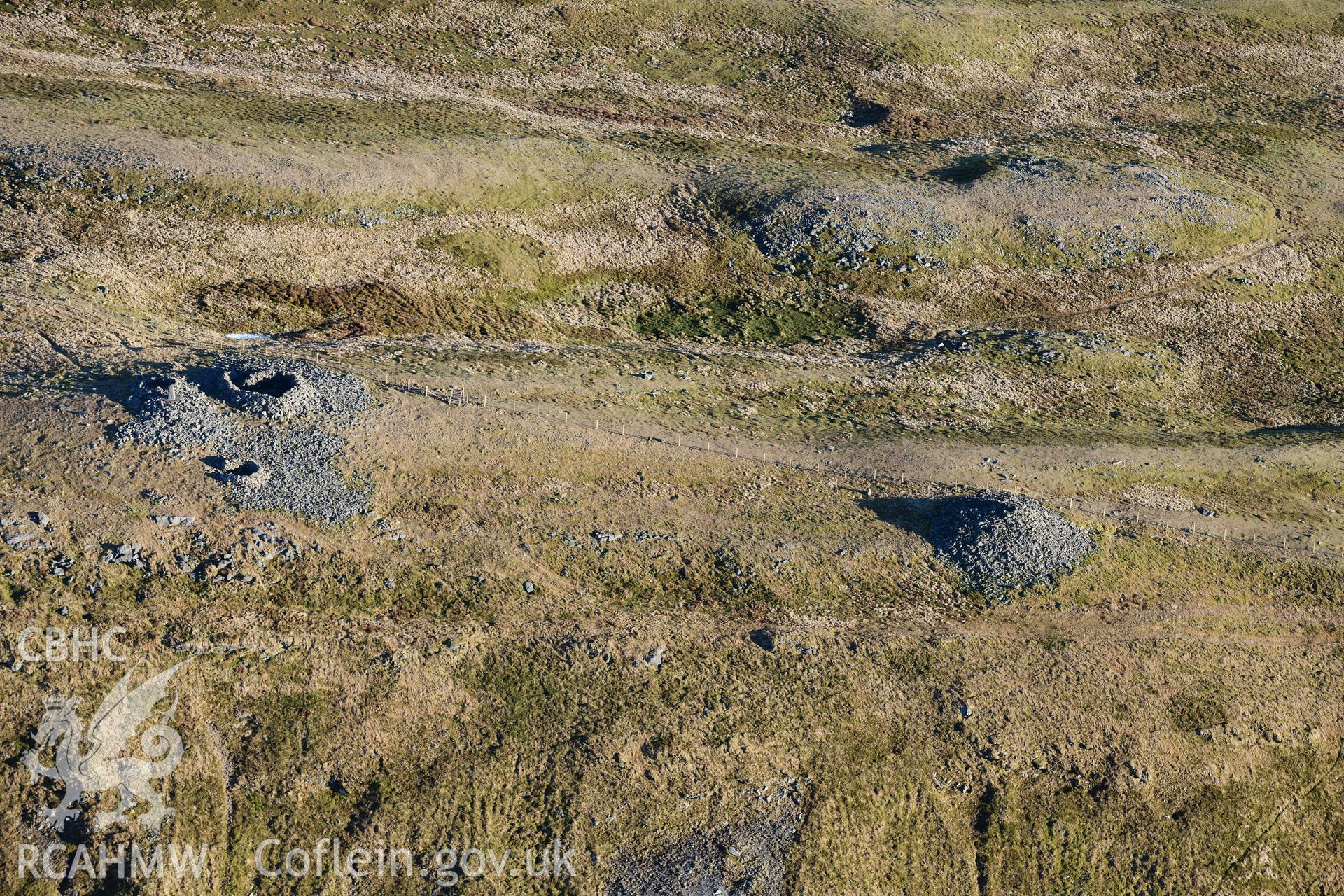 Oblique aerial photograph of Pen Plynlimon Fawr cairn cemetery. Taken during the Royal Commission’s programme of archaeological aerial reconnaissance by Toby Driver on 17th January 2022