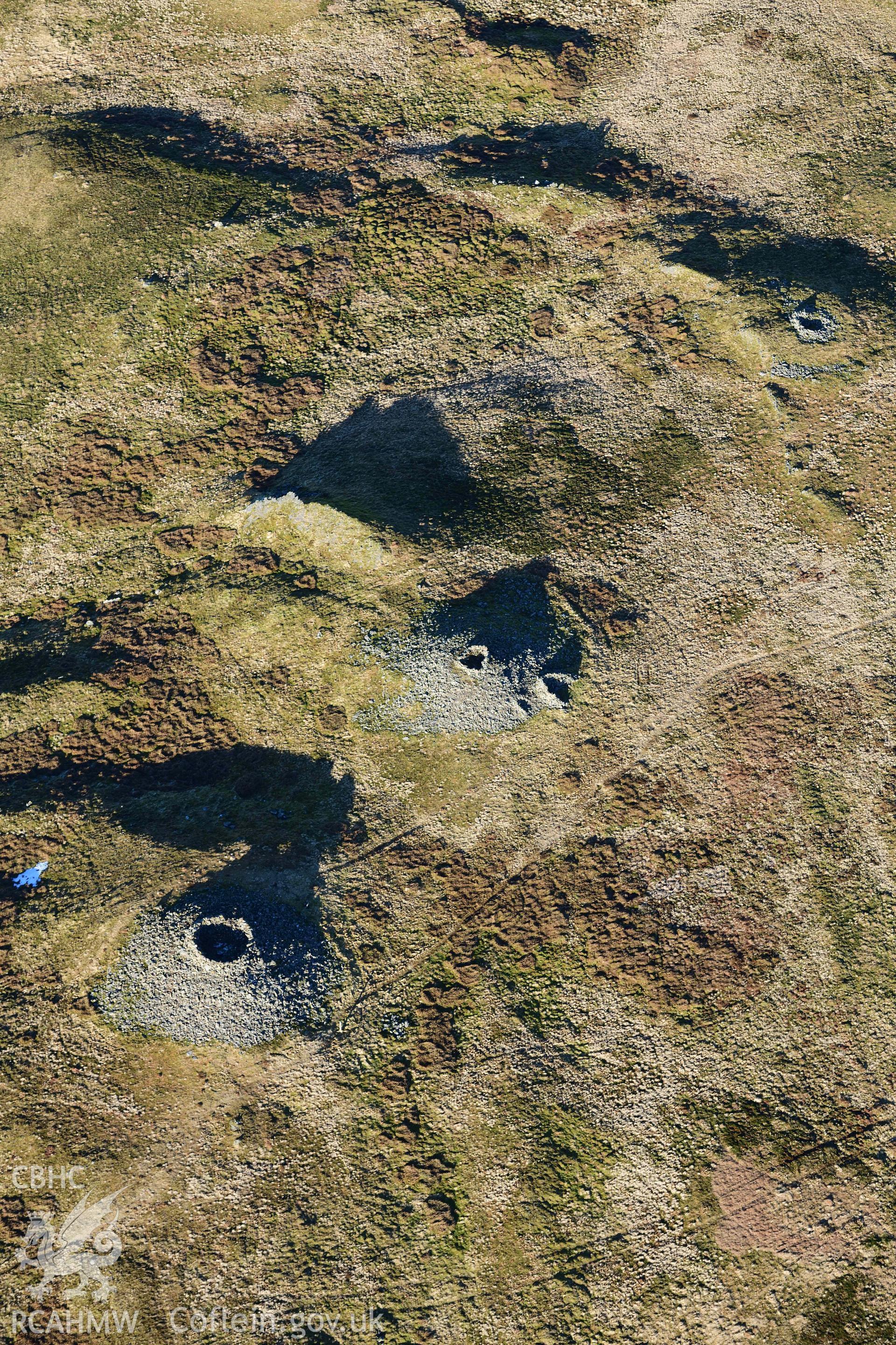 Oblique aerial photograph of Pen Pumlumon Arwystli cairn cemetery. Taken during the Royal Commission’s programme of archaeological aerial reconnaissance by Toby Driver on 17th January 2022